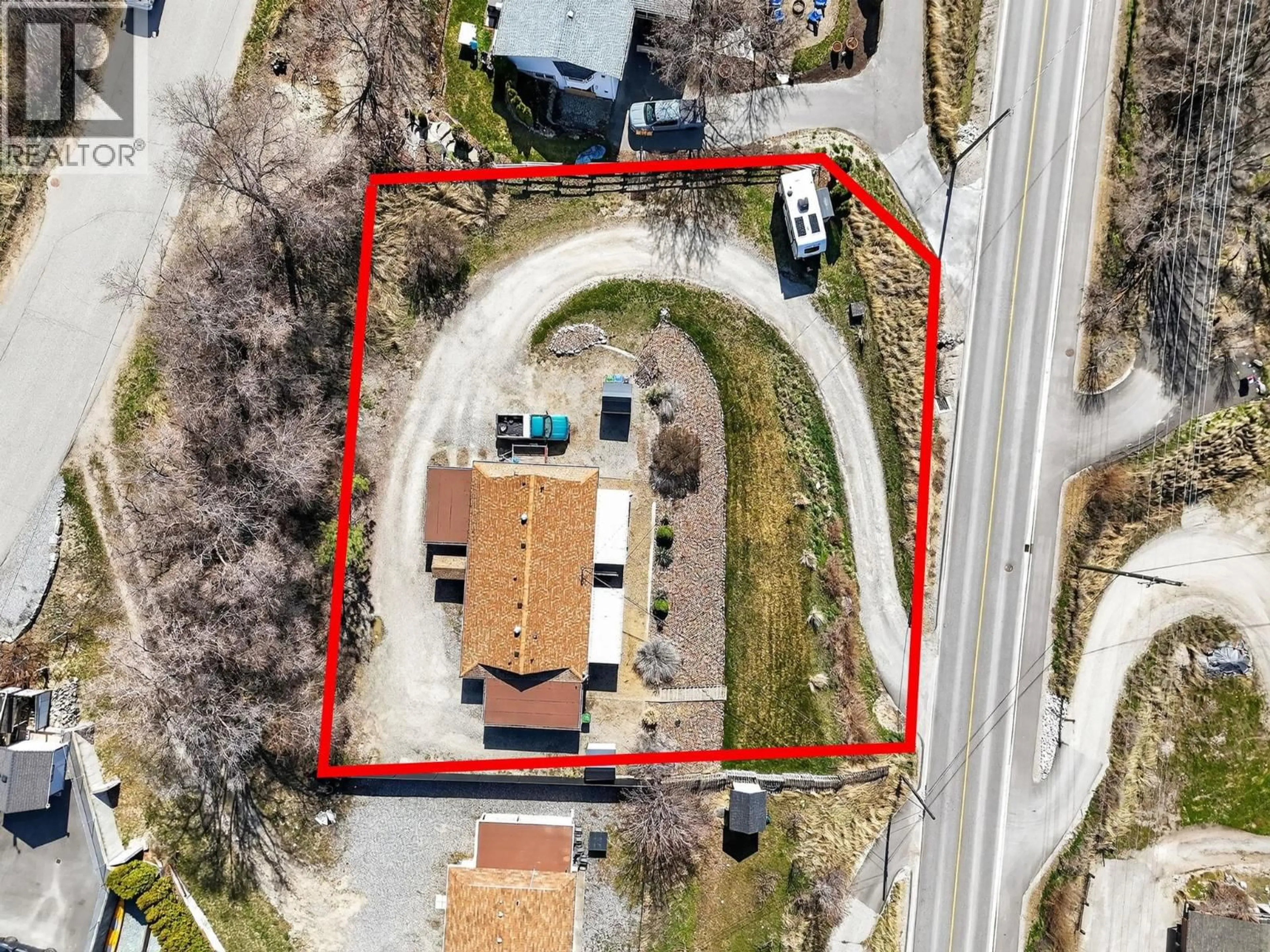 A pic from outside/outdoor area/front of a property/back of a property/a pic from drone, street for 11263 LODGE ROAD, Lake Country British Columbia V4V1Y2