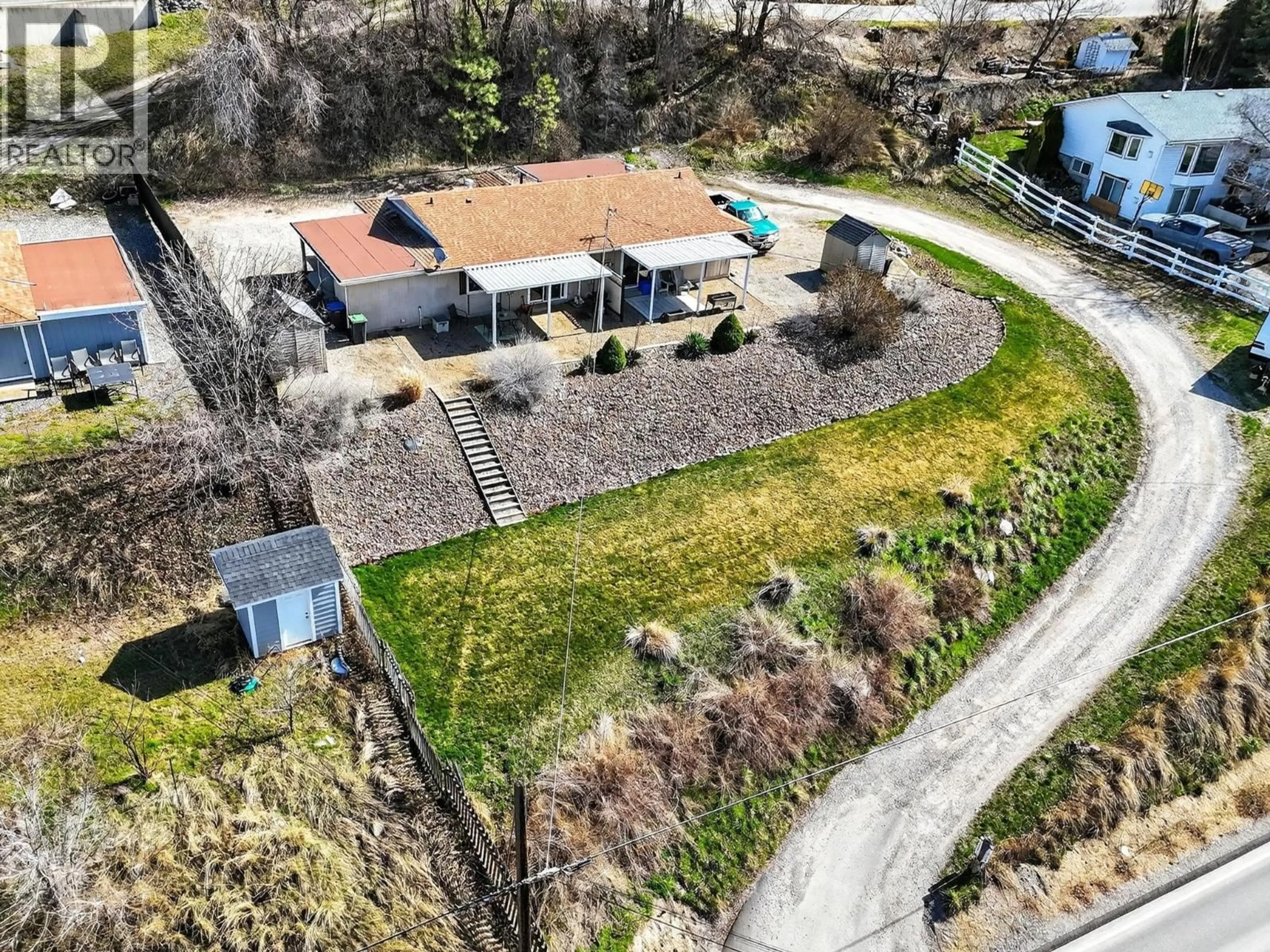 A pic from outside/outdoor area/front of a property/back of a property/a pic from drone, street for 11263 LODGE ROAD, Lake Country British Columbia V4V1Y2