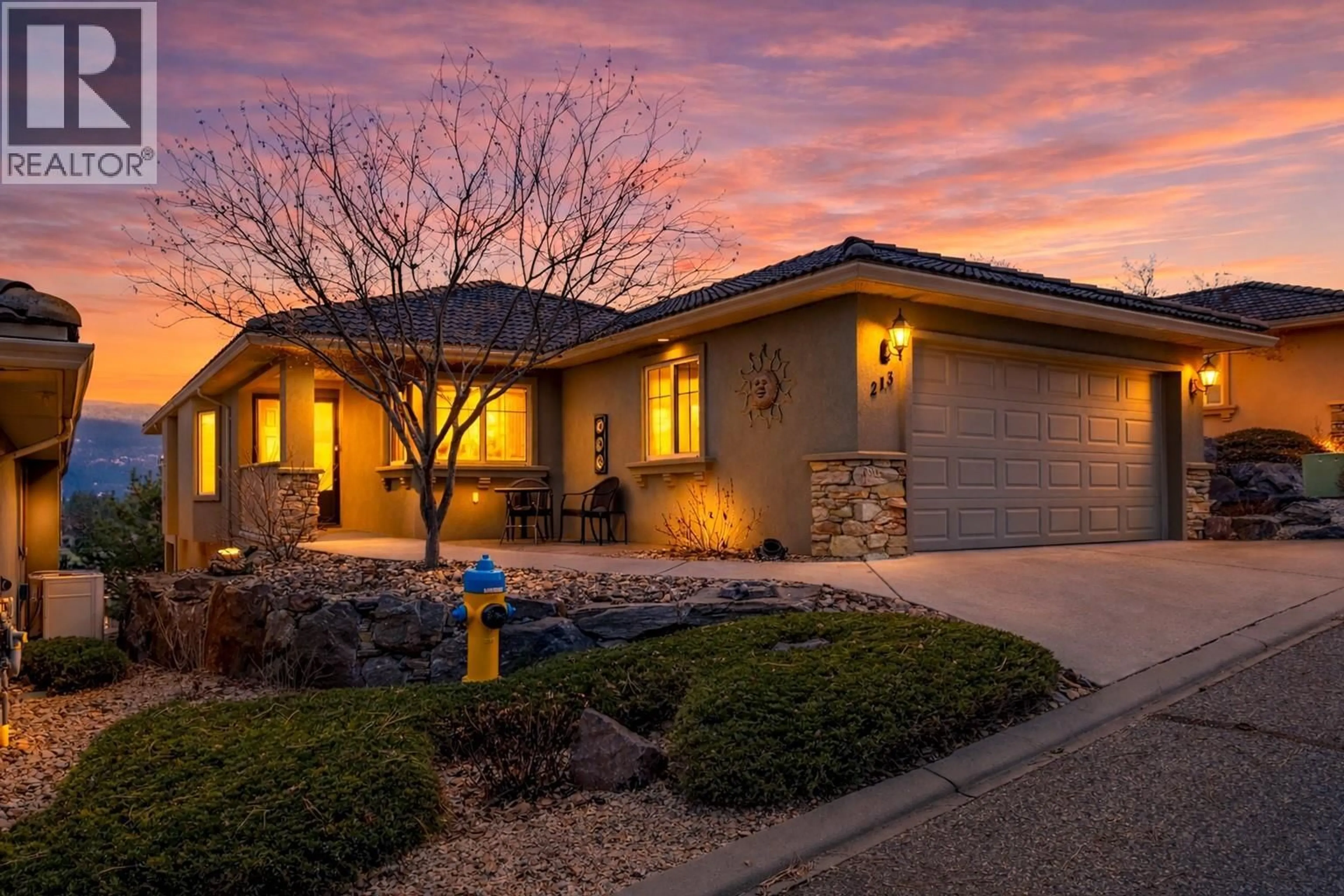 Home with brick exterior material, street for 213 - 2455 QUAIL RIDGE BOULEVARD, Kelowna British Columbia V1V2S8