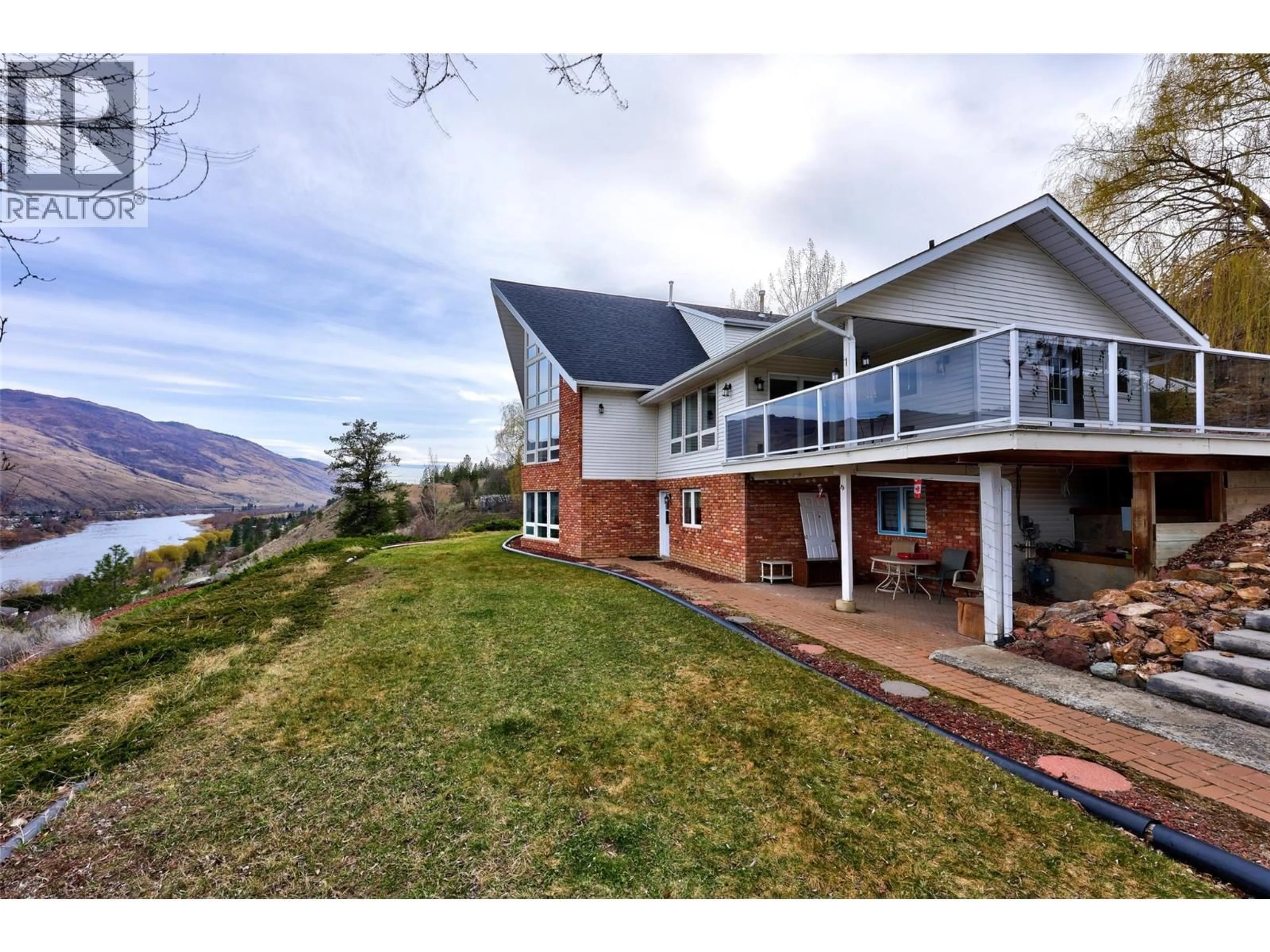 A pic from outside/outdoor area/front of a property/back of a property/a pic from drone, water/lake/river/ocean view for 4702 WESTSYDE ROAD, Kamloops British Columbia V2B8N4