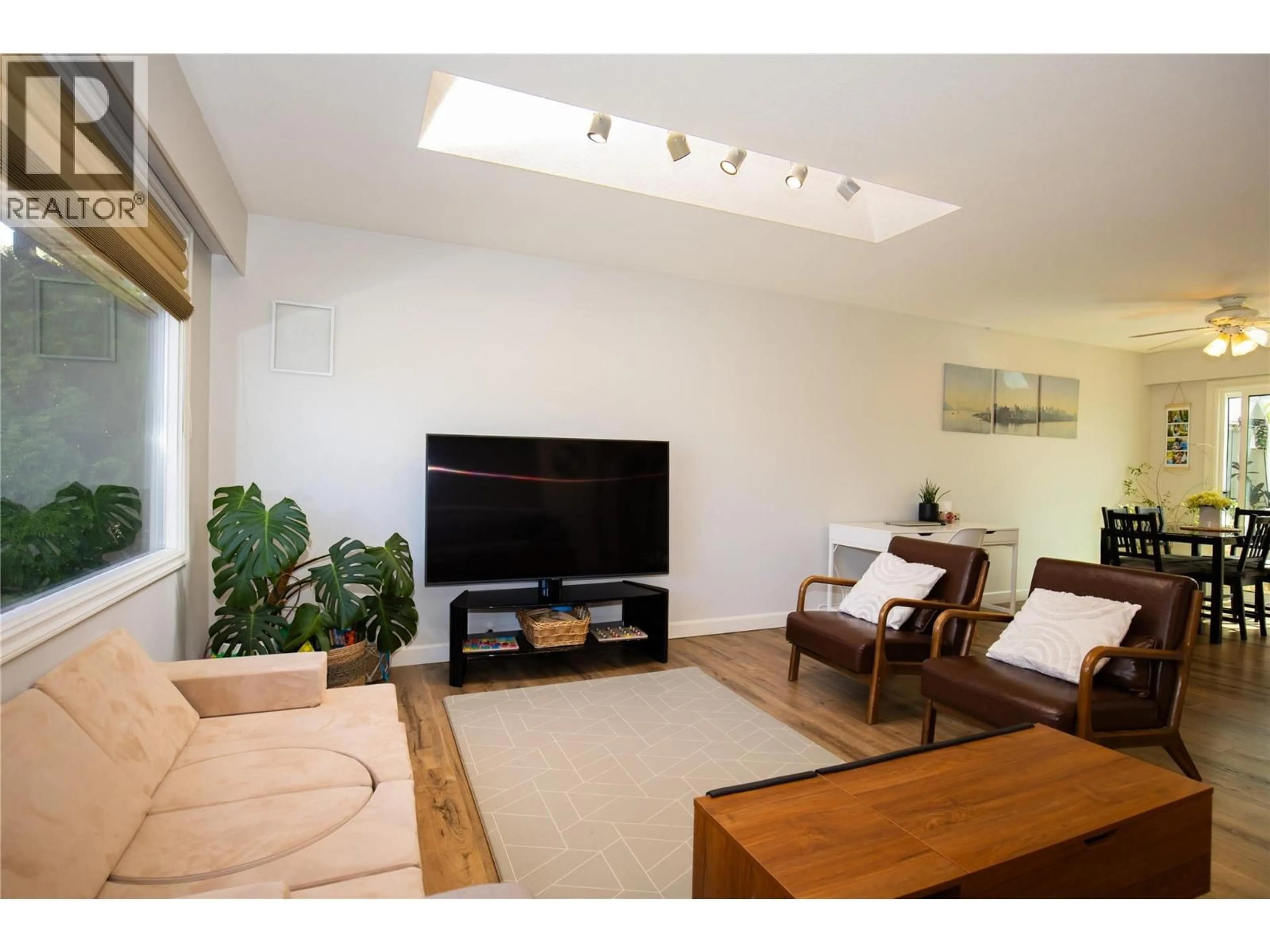 Living room with furniture, wood/laminate floor for 2549 CRESTLINE PLACE, Kamloops British Columbia V2B4V5