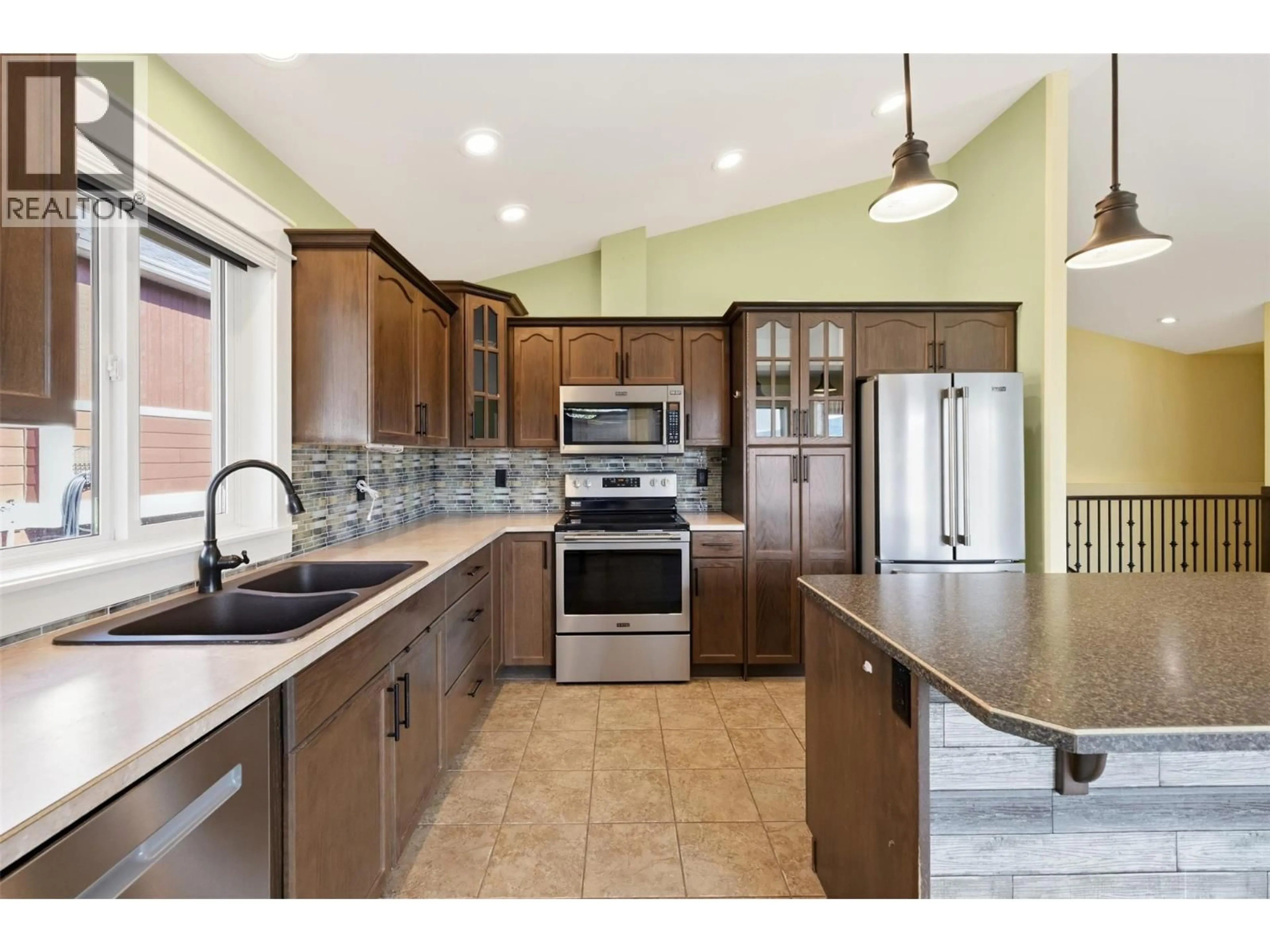 Open concept kitchen, ceramic/tile floor for 109 - 4400 MCLEAN CREEK ROAD, Okanagan Falls British Columbia V0H1R5