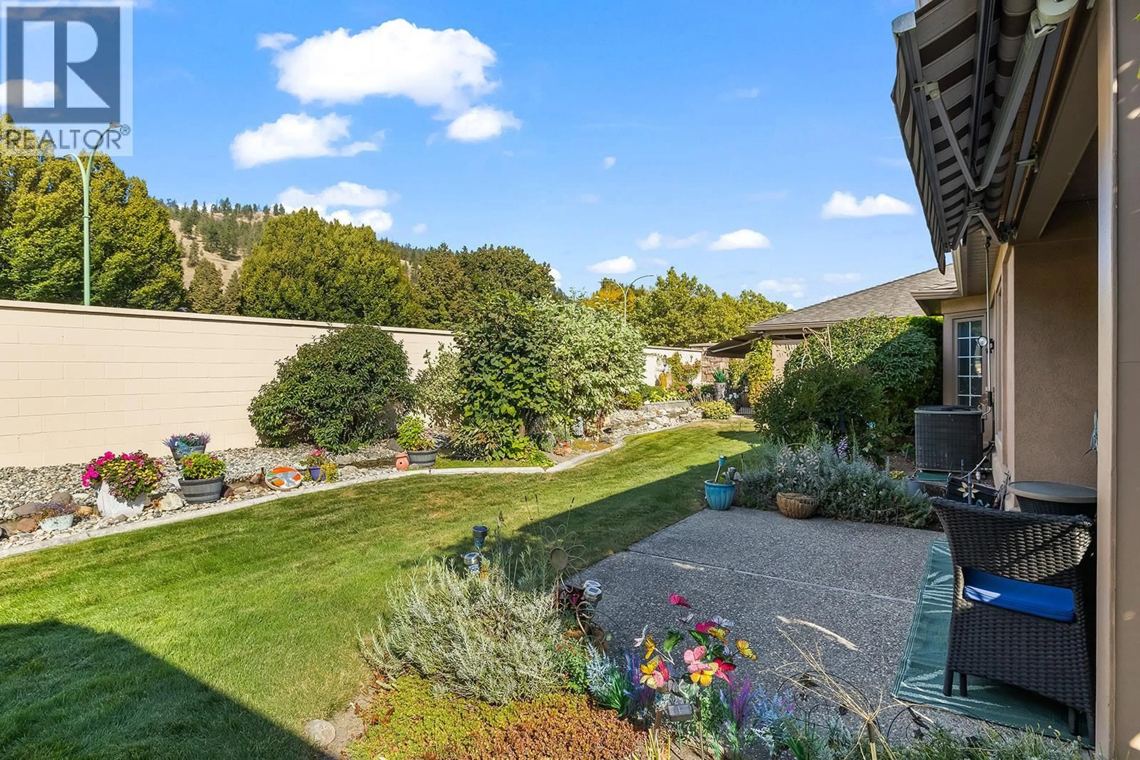 A pic from outside/outdoor area/front of a property/back of a property/a pic from drone, water/lake/river/ocean view for 130 - 595 YATES ROAD, Kelowna British Columbia V1V1P8