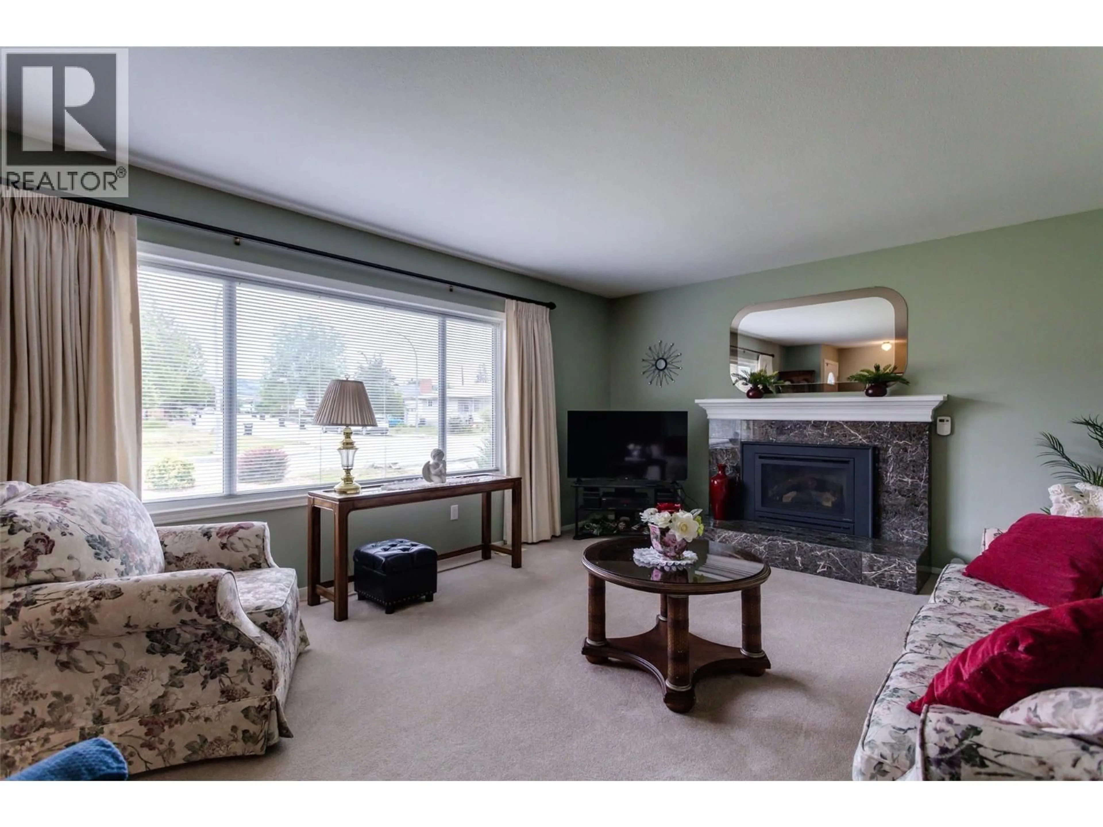 Living room with furniture, carpet floor for 3607 39 AVENUE, Vernon British Columbia V1T3E5
