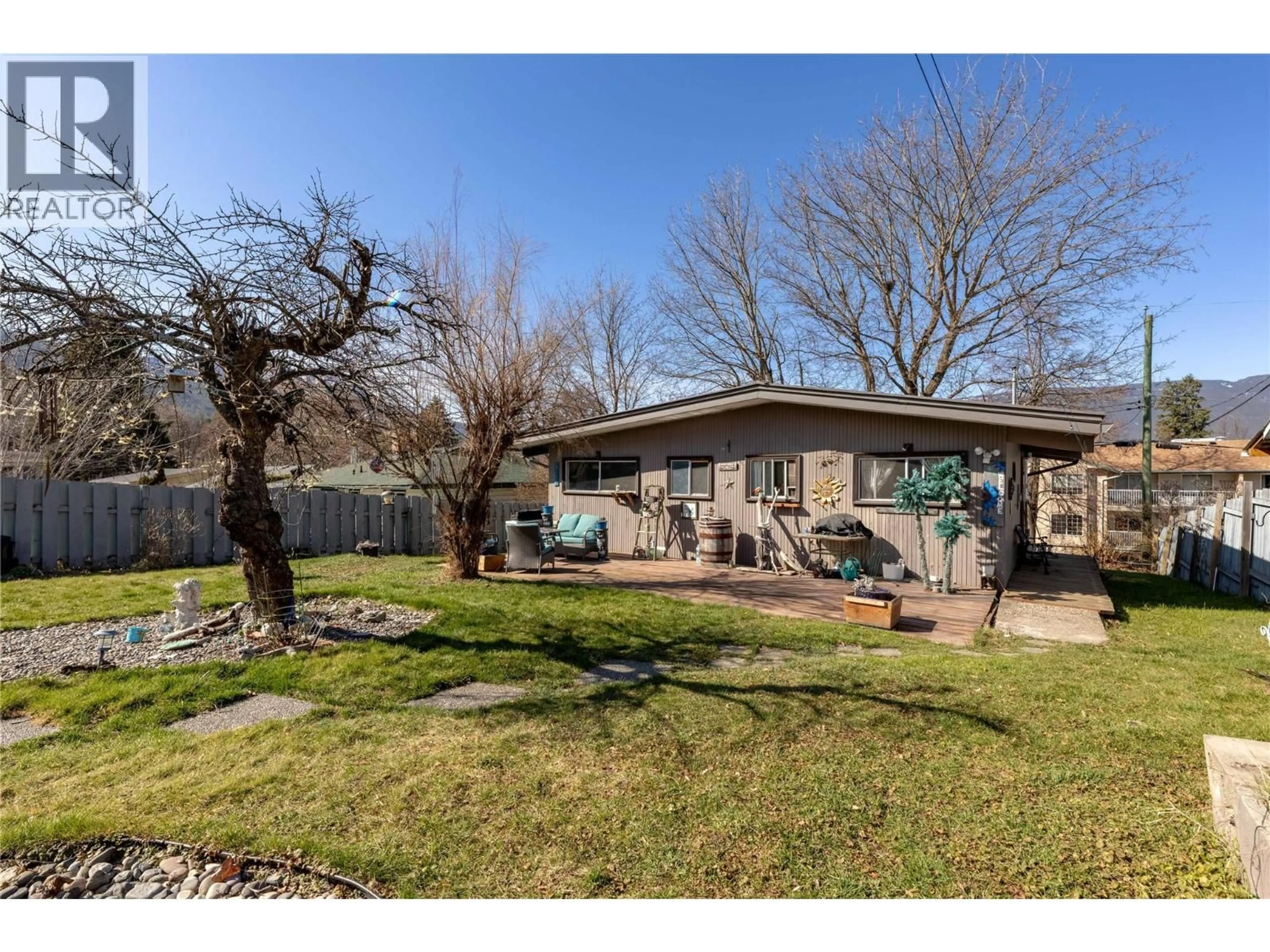 A pic from outside/outdoor area/front of a property/back of a property/a pic from drone, street for 330 6 STREET, Salmon Arm British Columbia V1E4E8