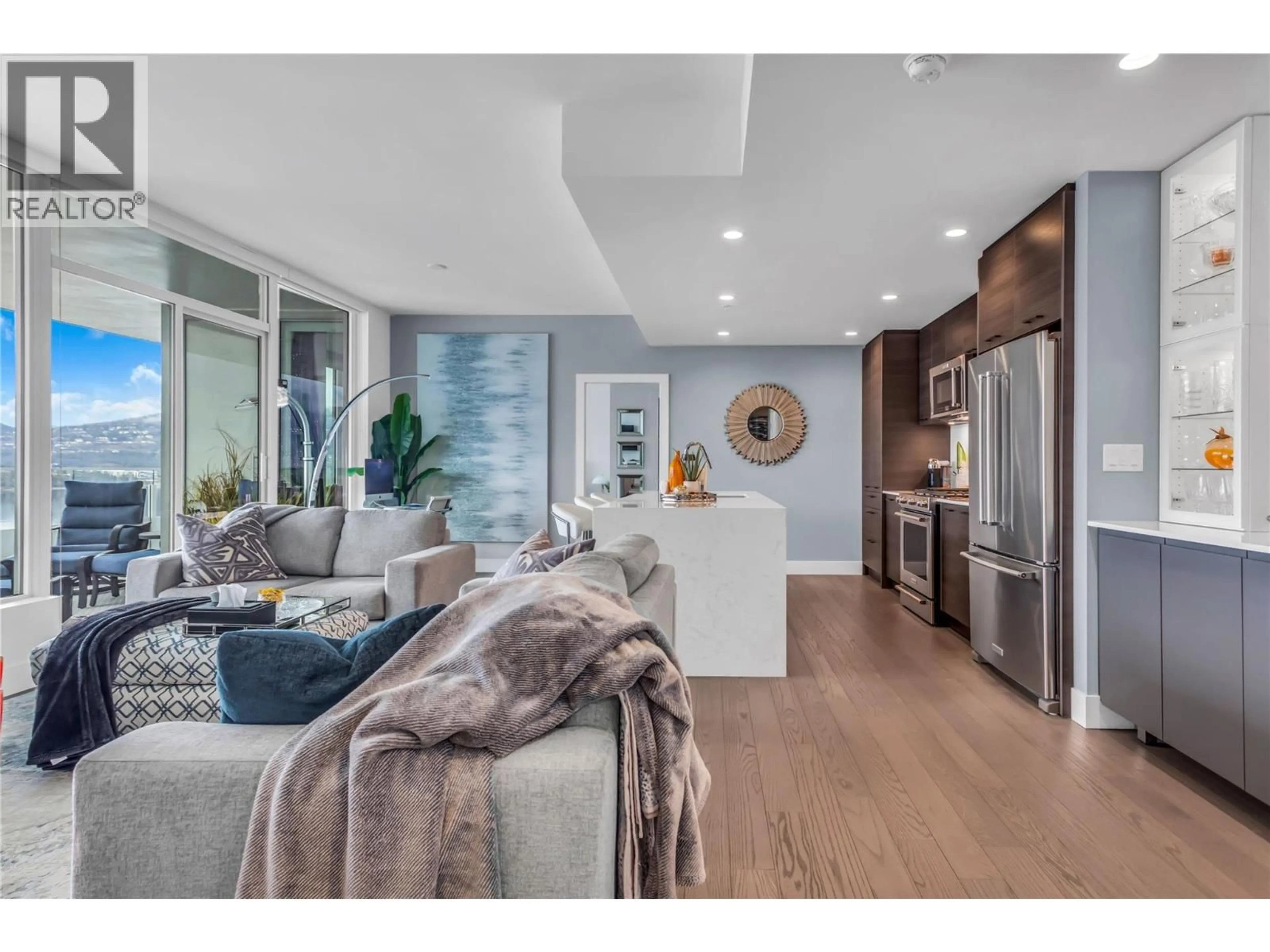 Open concept kitchen, wood/laminate floor for 2004 - 1181 SUNSET DRIVE, Kelowna British Columbia V1Y0L4