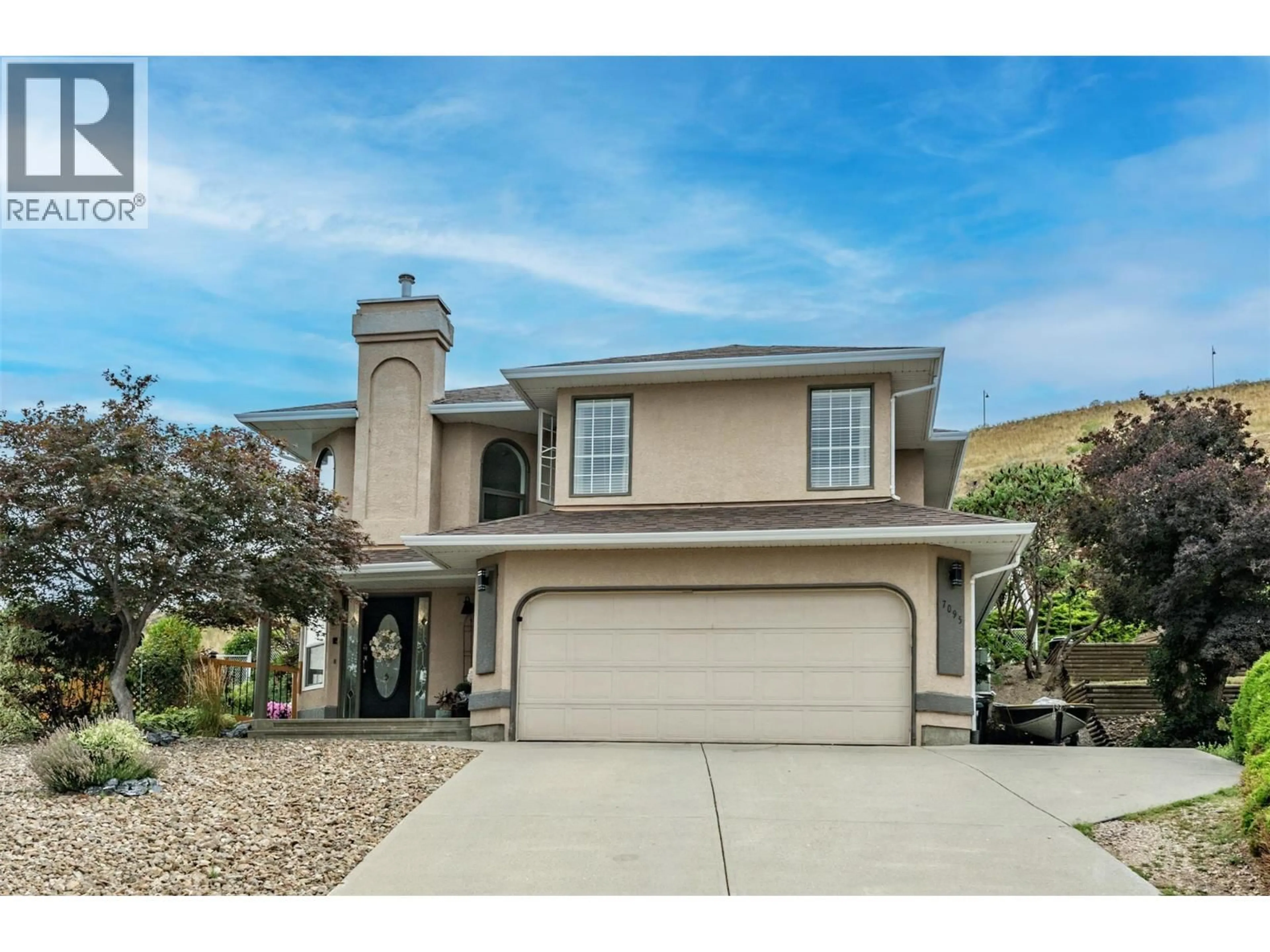 Home with vinyl exterior material, street for 7095 AMBER DRIVE, Vernon British Columbia V1H1P4