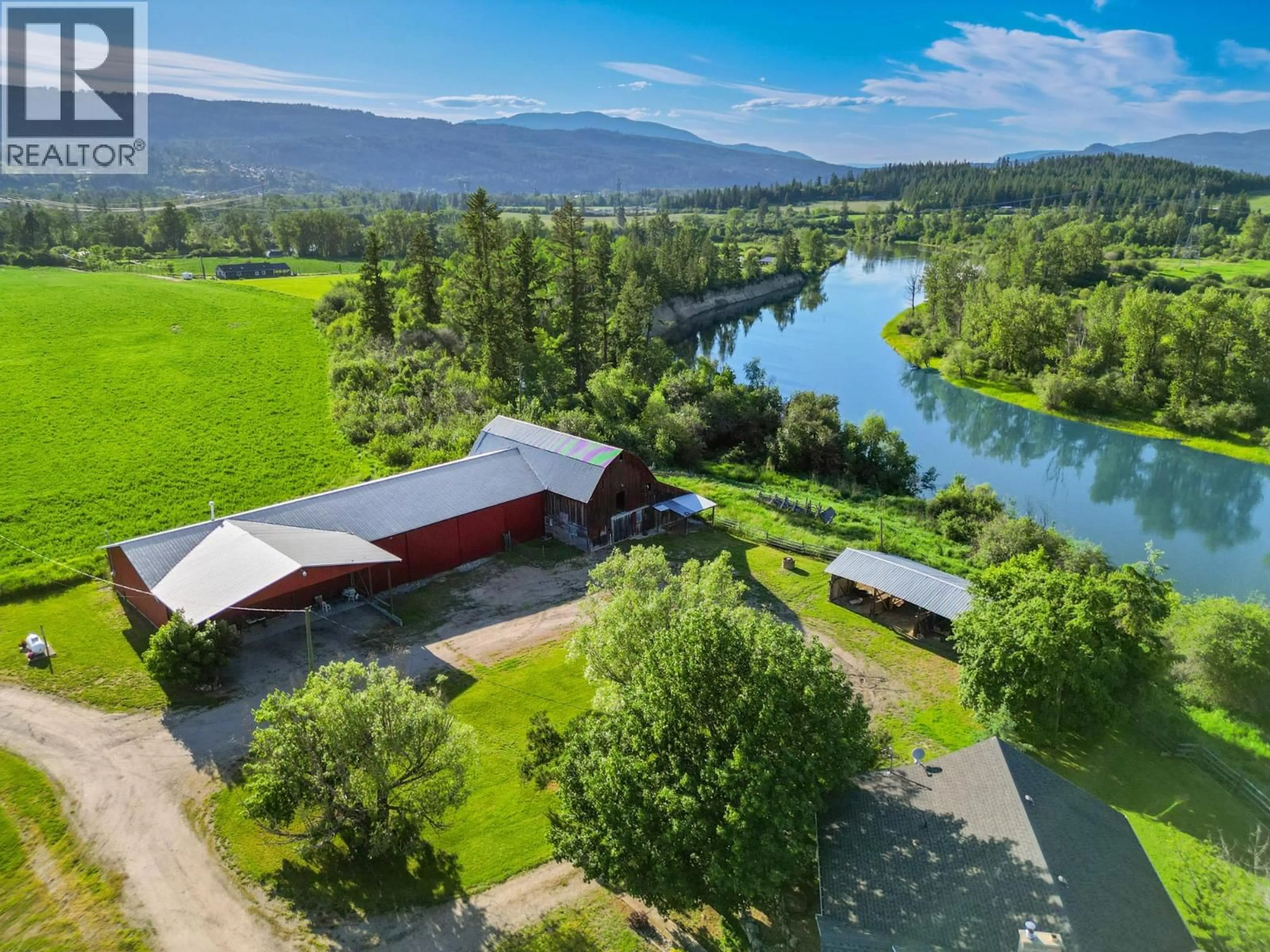 A pic from outside/outdoor area/front of a property/back of a property/a pic from drone, water/lake/river/ocean view for 850 FORTUNE ROAD, Spallumcheen British Columbia V0E1V0