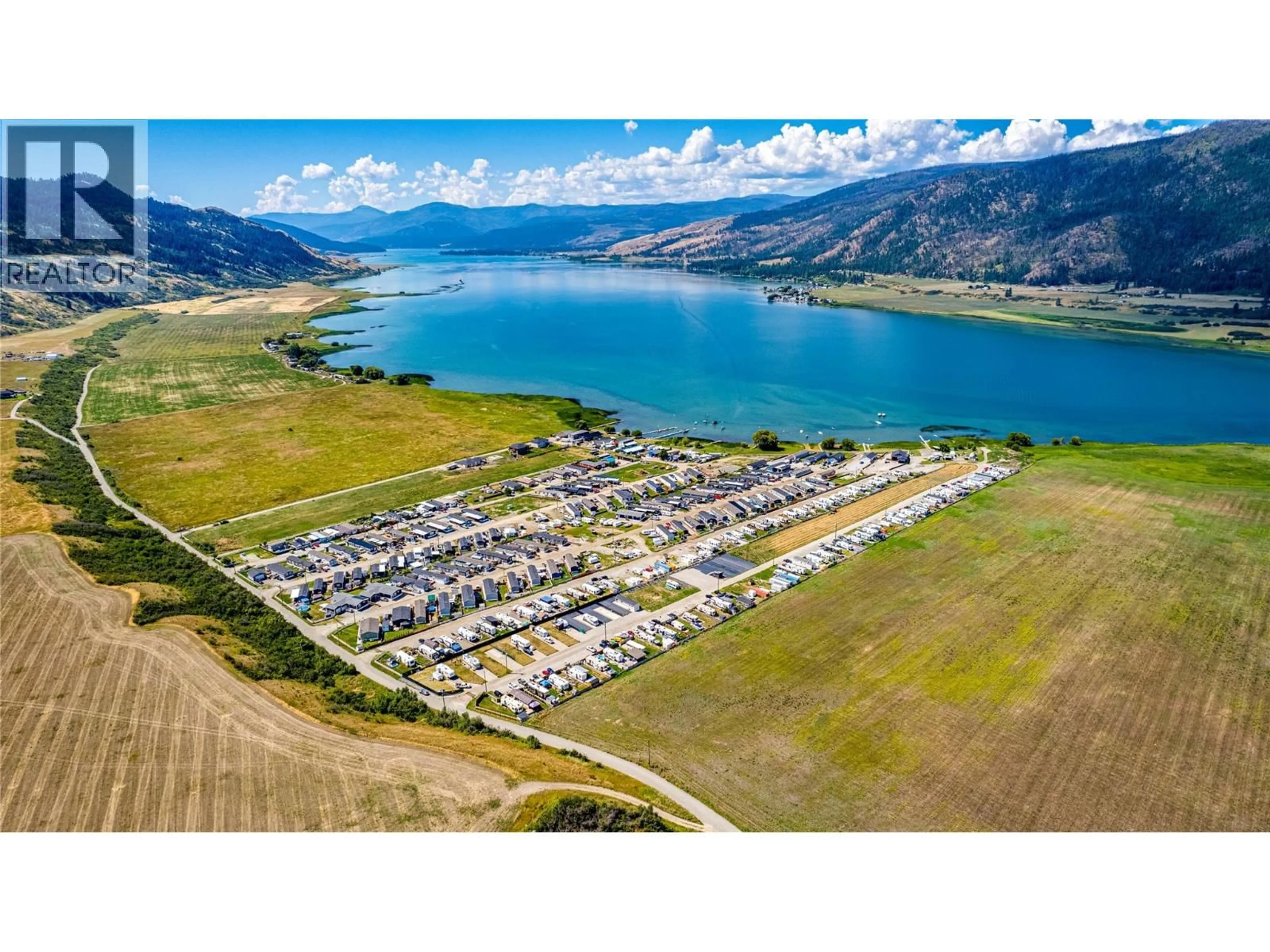 A pic from outside/outdoor area/front of a property/back of a property/a pic from drone, water/lake/river/ocean view for 8 - 61 ANTOINE ROAD, Vernon British Columbia V1H2A3