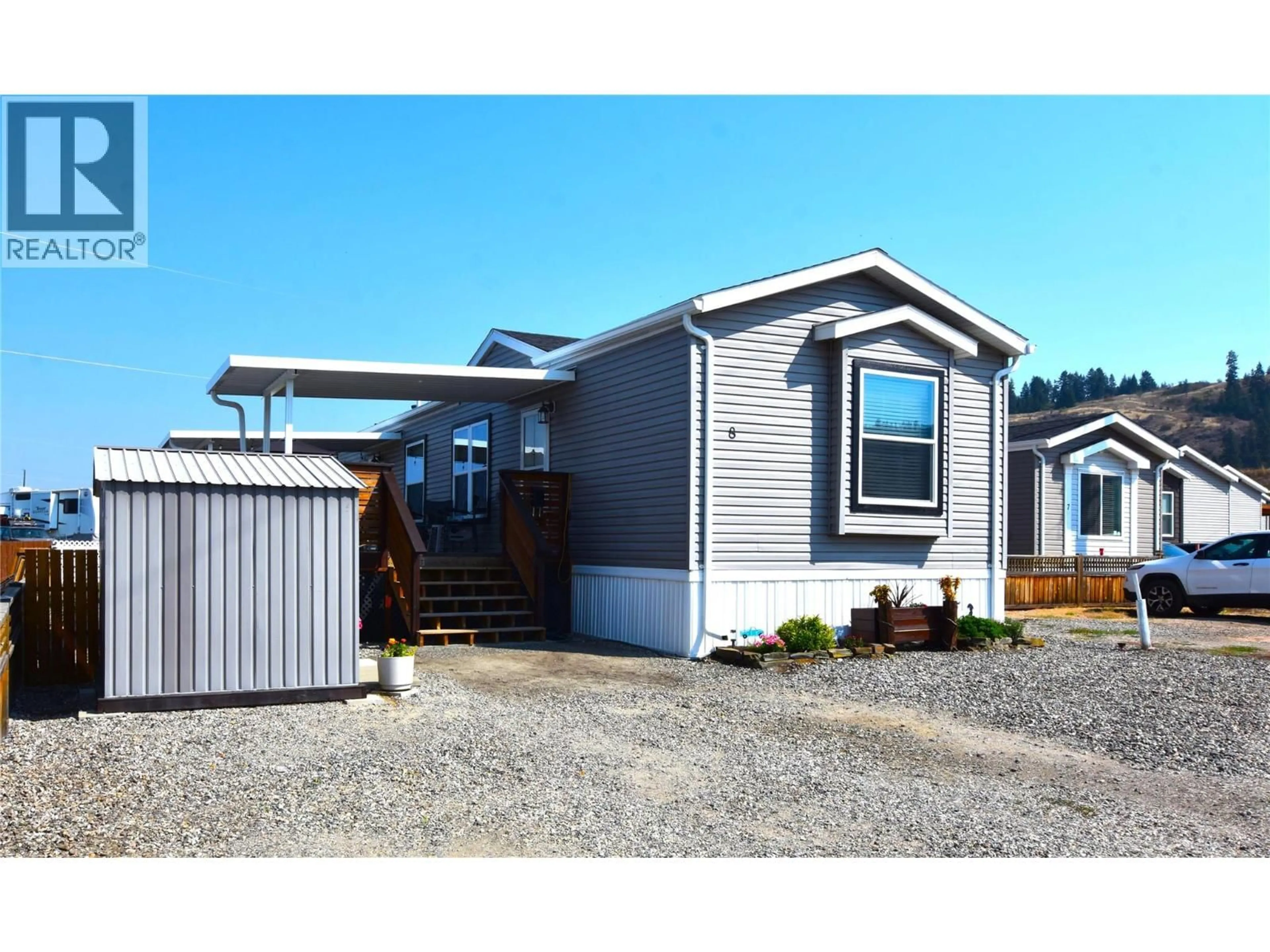 Home with vinyl exterior material, street for 8 - 61 ANTOINE ROAD, Vernon British Columbia V1H2A3