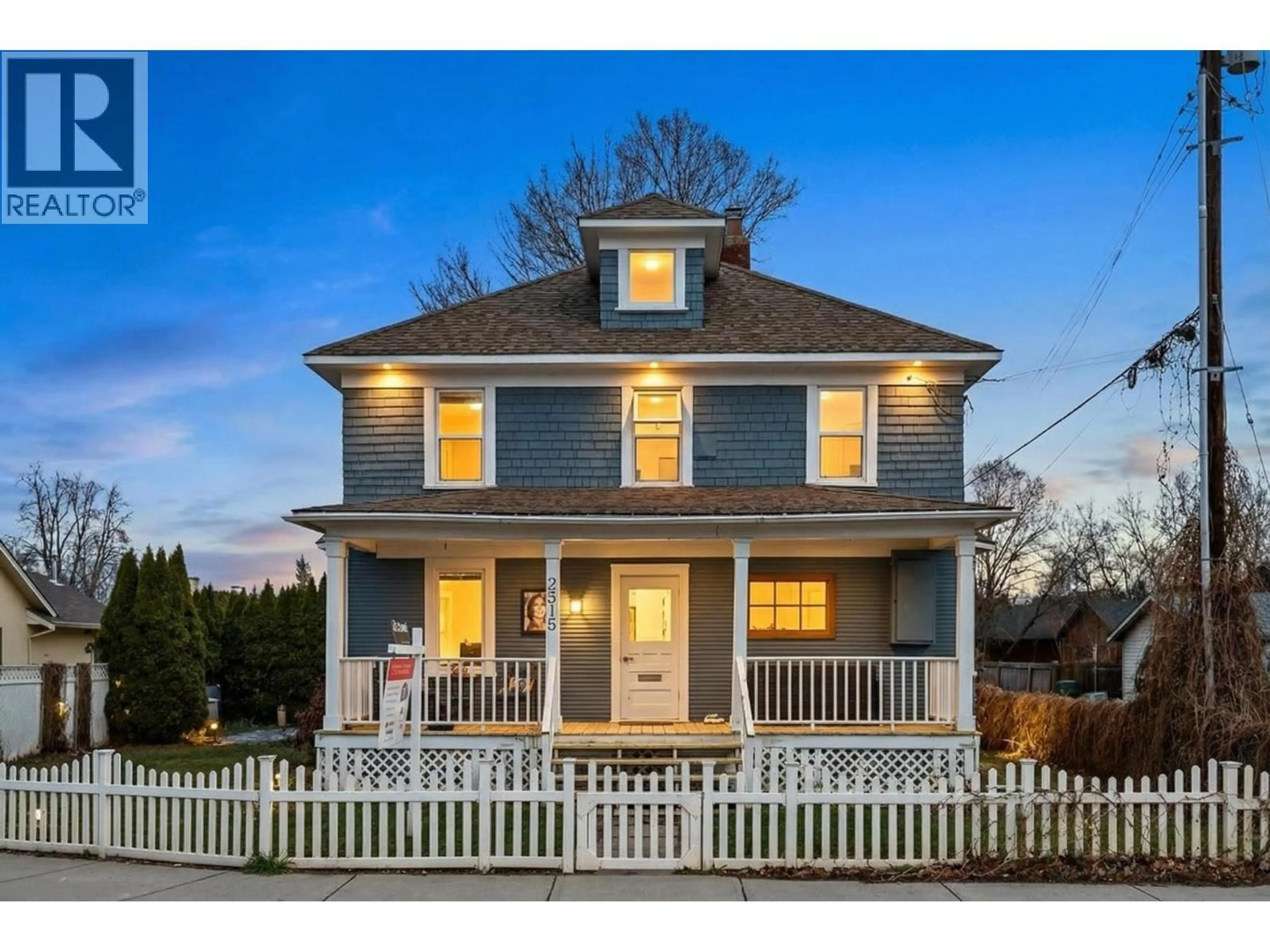 Home with vinyl exterior material, street for 2319 PANDOSY STREET, Kelowna British Columbia V1Y1T4