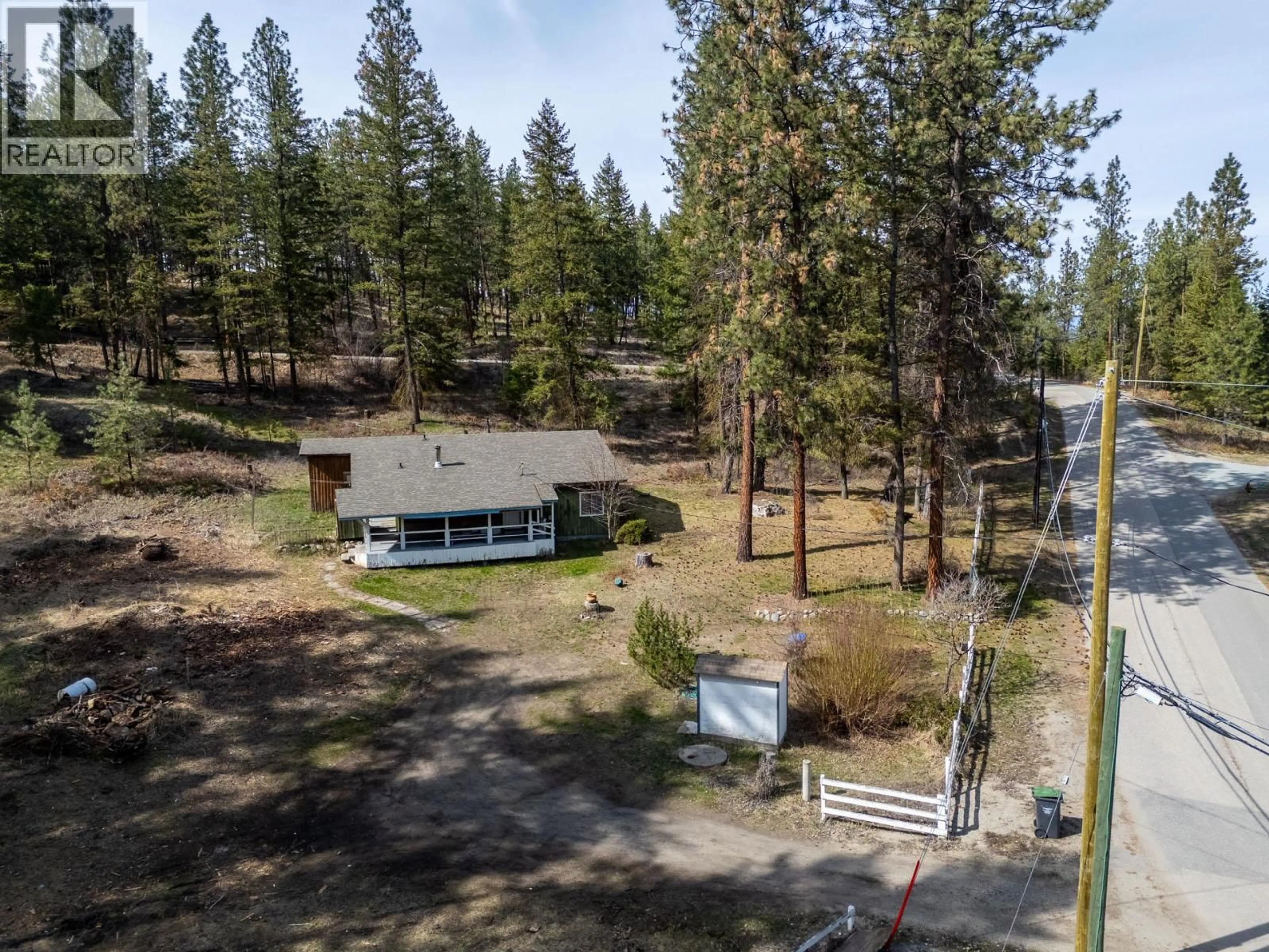 A pic from outside/outdoor area/front of a property/back of a property/a pic from drone, forest/trees view for 3525 MATHEWS ROAD, Kelowna British Columbia V1W4C6
