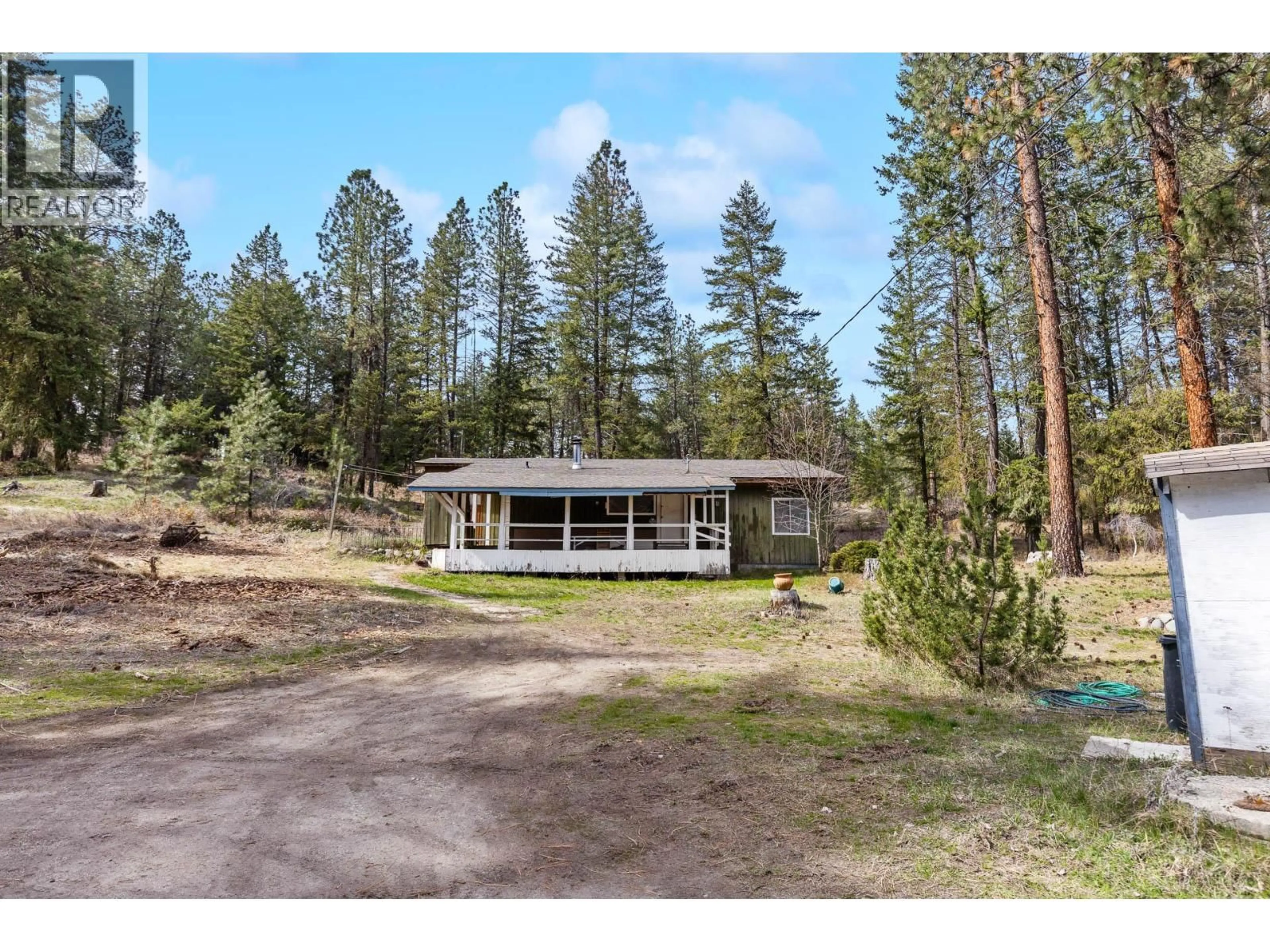 A pic from outside/outdoor area/front of a property/back of a property/a pic from drone, forest/trees view for 3525 MATHEWS ROAD, Kelowna British Columbia V1W4C6