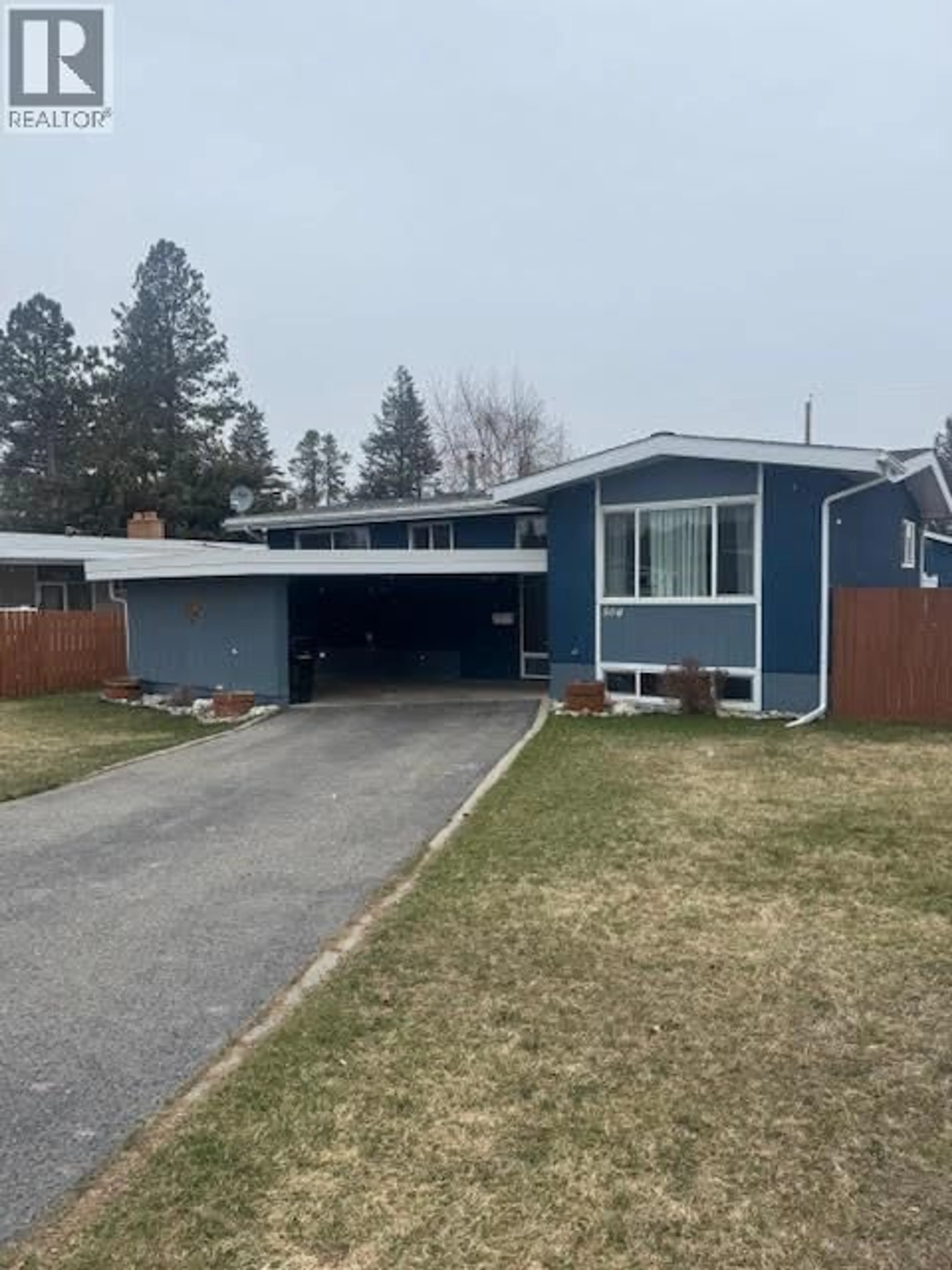 Home with vinyl exterior material, street for 504 10TH STREET SOUTH, Cranbrook British Columbia V1C1S4