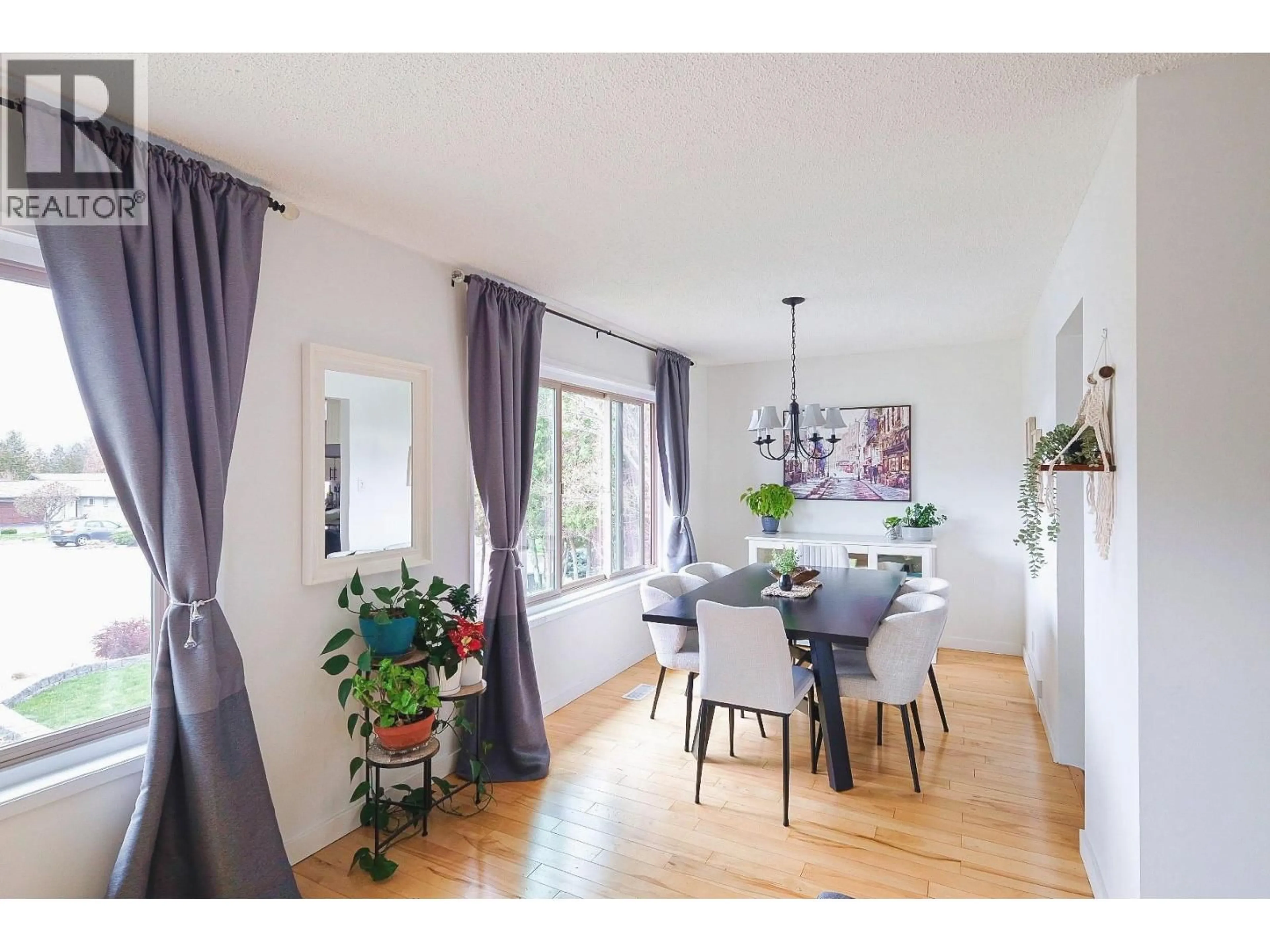 Dining room, wood/laminate floor for 144 ADAMSON PLACE, Penticton British Columbia V2A7R9