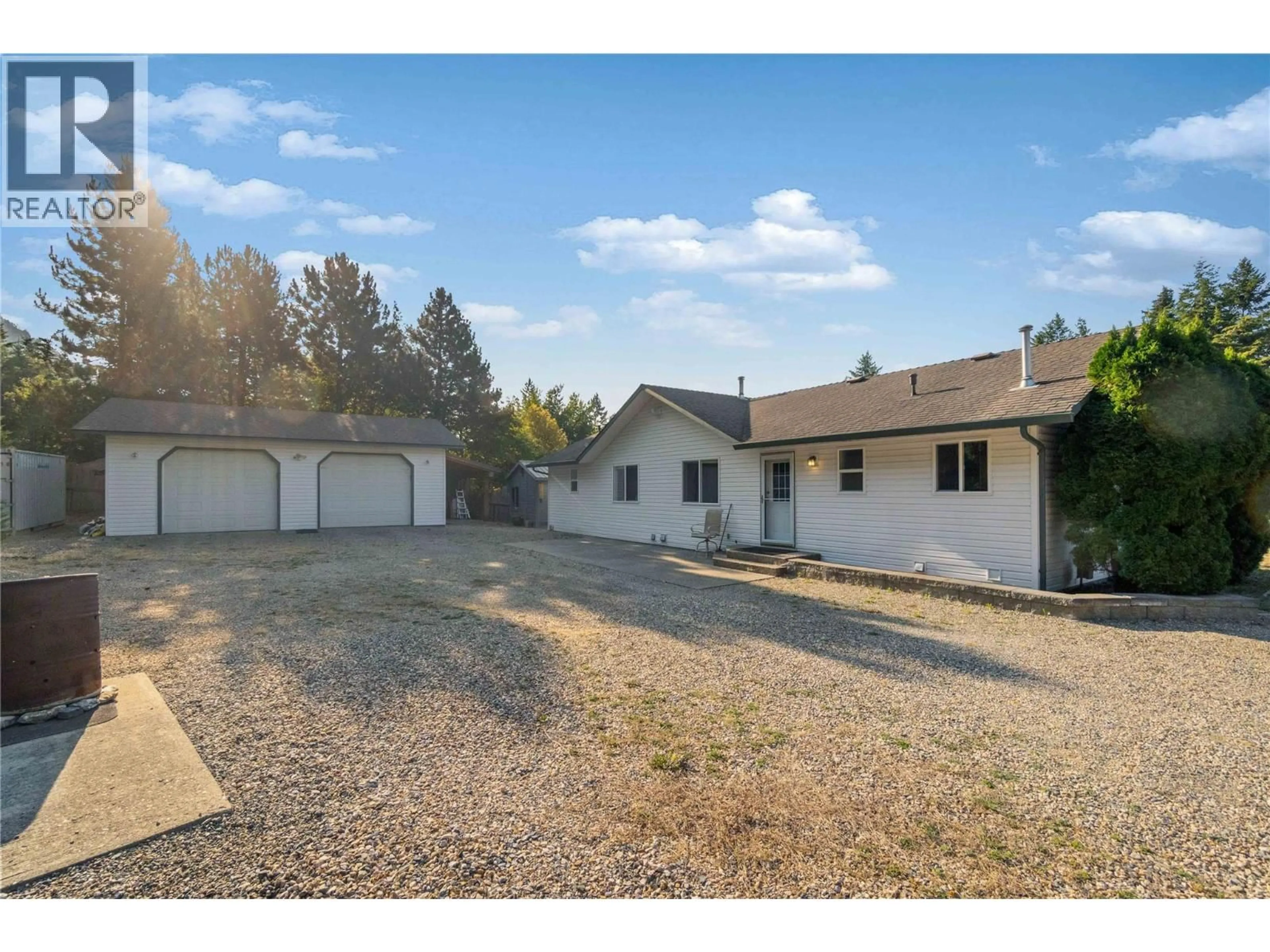 A pic from outside/outdoor area/front of a property/back of a property/a pic from drone, street for 760 MOBLEY ROAD, Tappen British Columbia V0E2X1