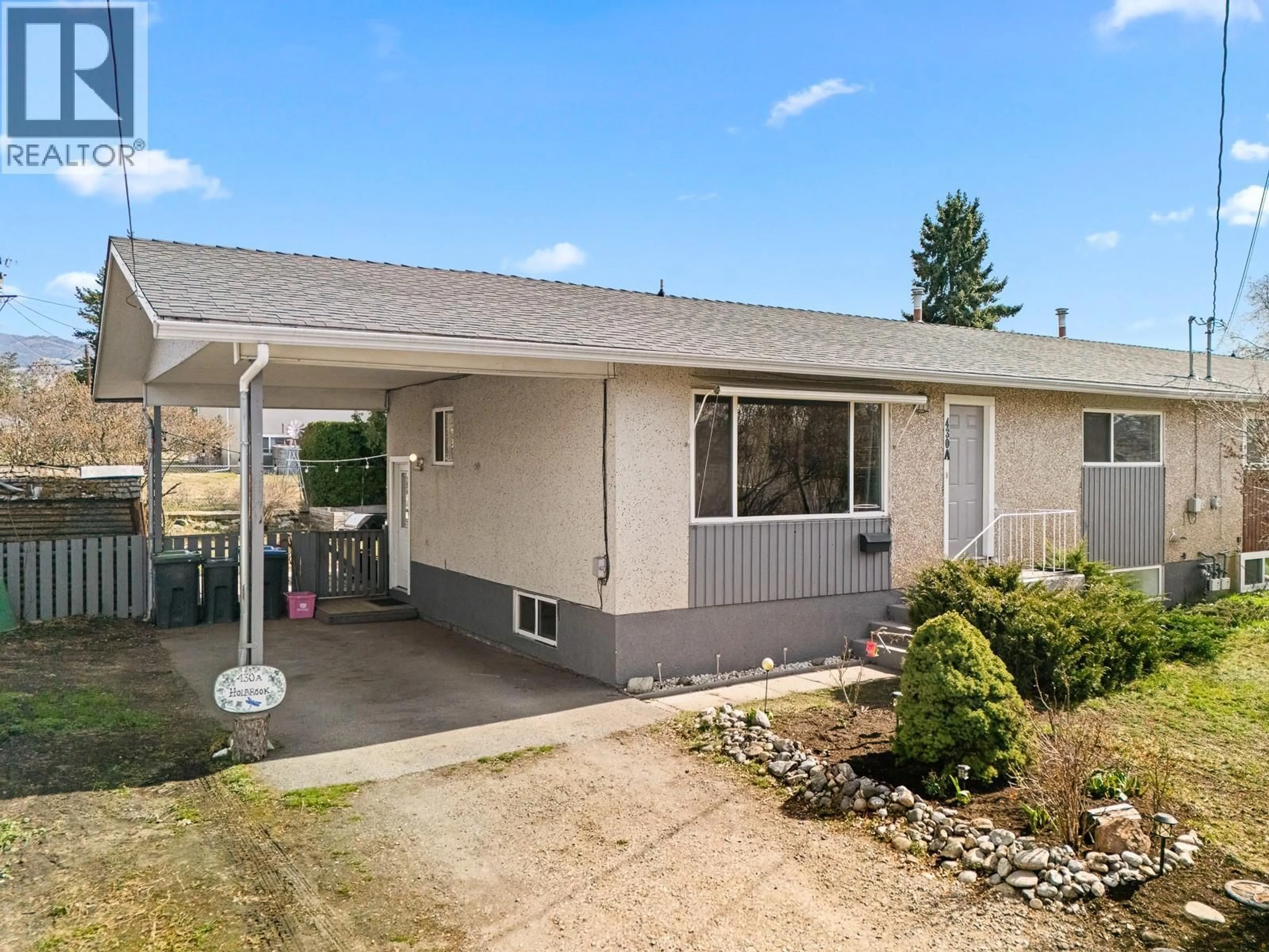 Home with vinyl exterior material, street for 430A HOLBROOK ROAD WEST, Kelowna British Columbia V1X1S3