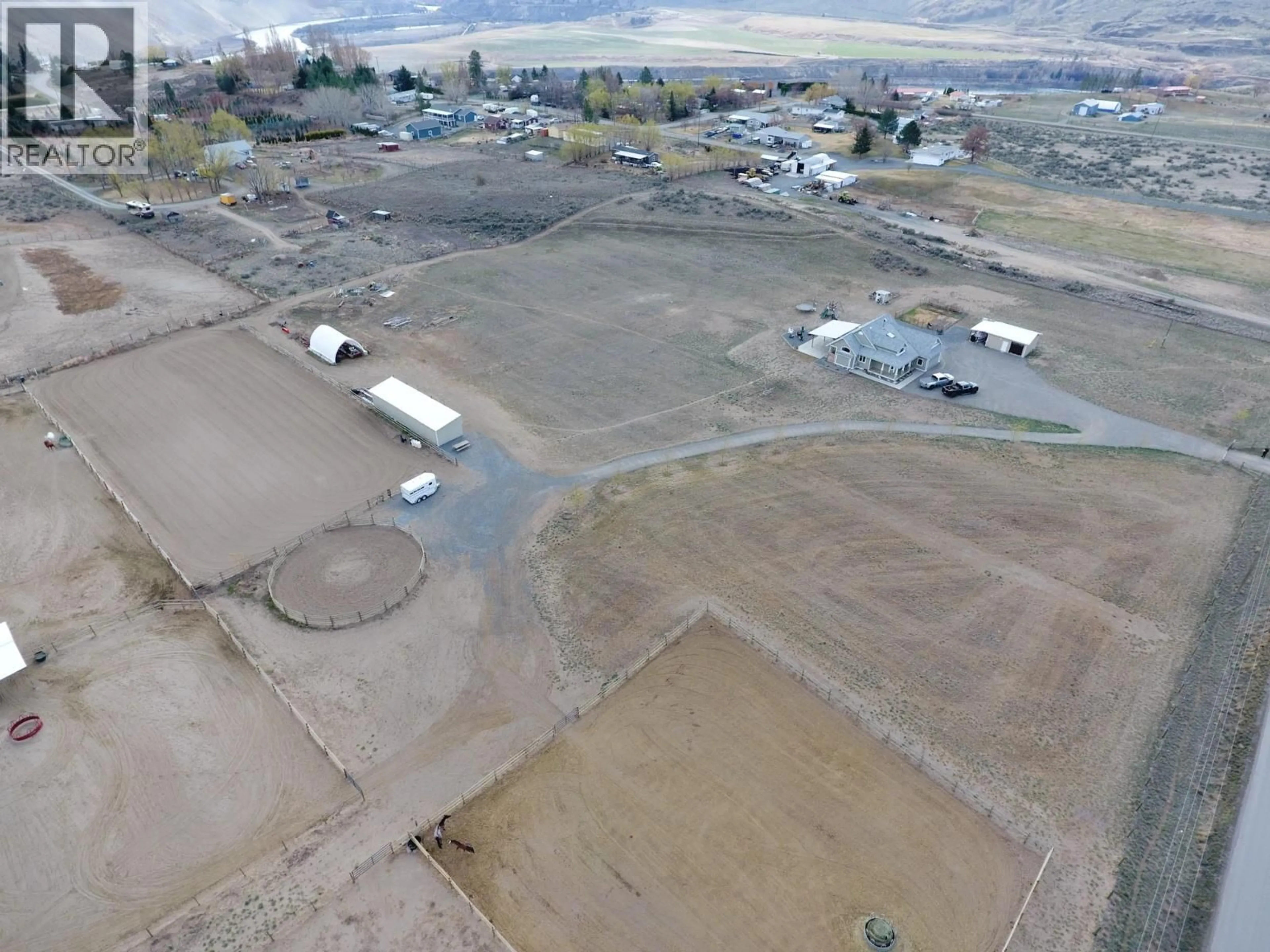 A pic from outside/outdoor area/front of a property/back of a property/a pic from drone, mountain view for 1480 THOMPSON RIVER DRIVE, Kamloops British Columbia V0K2J0