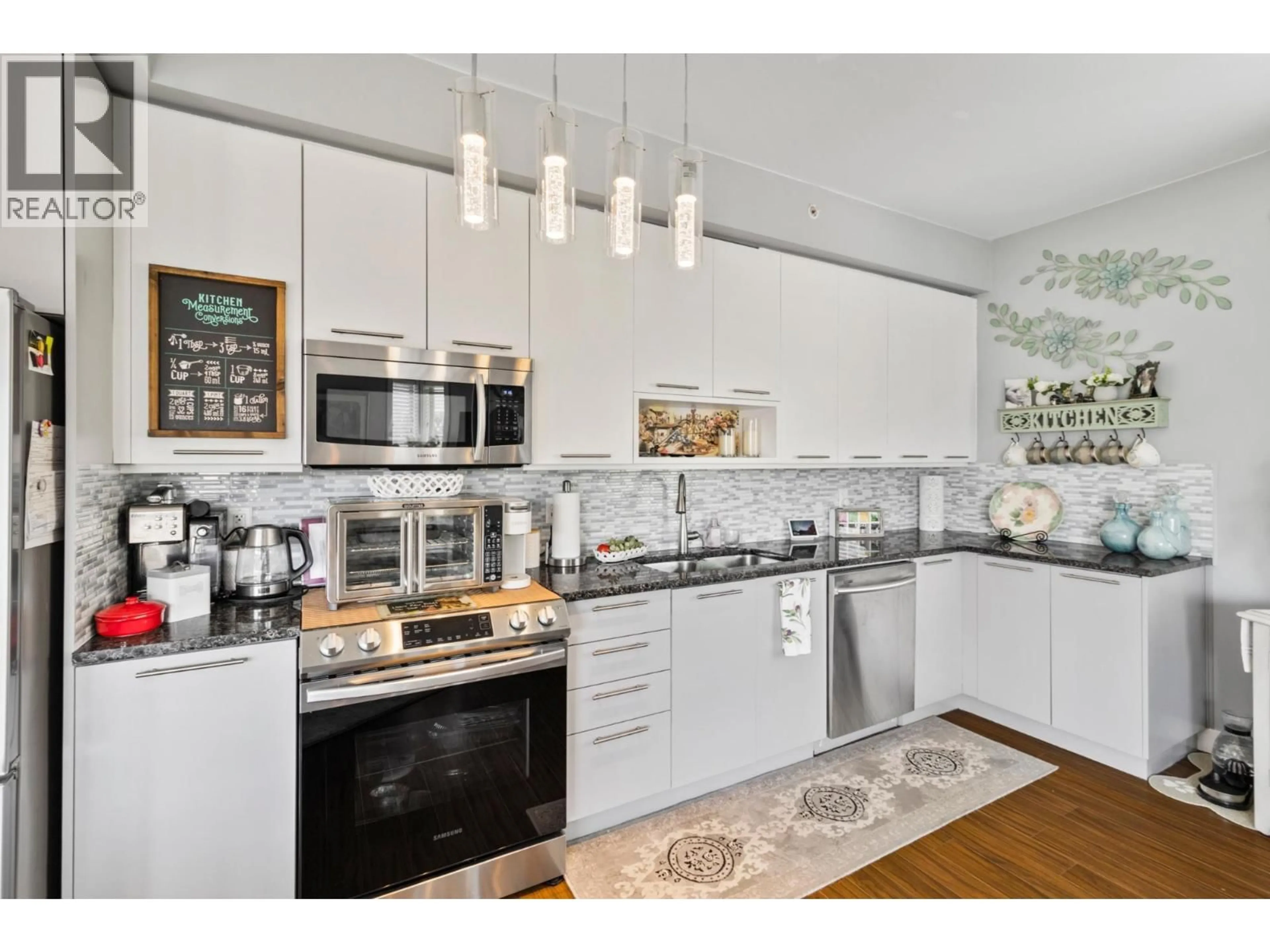 Open concept kitchen, unknown for 2413 - 1030 TALASA WAY, Kamloops British Columbia V2H0C3