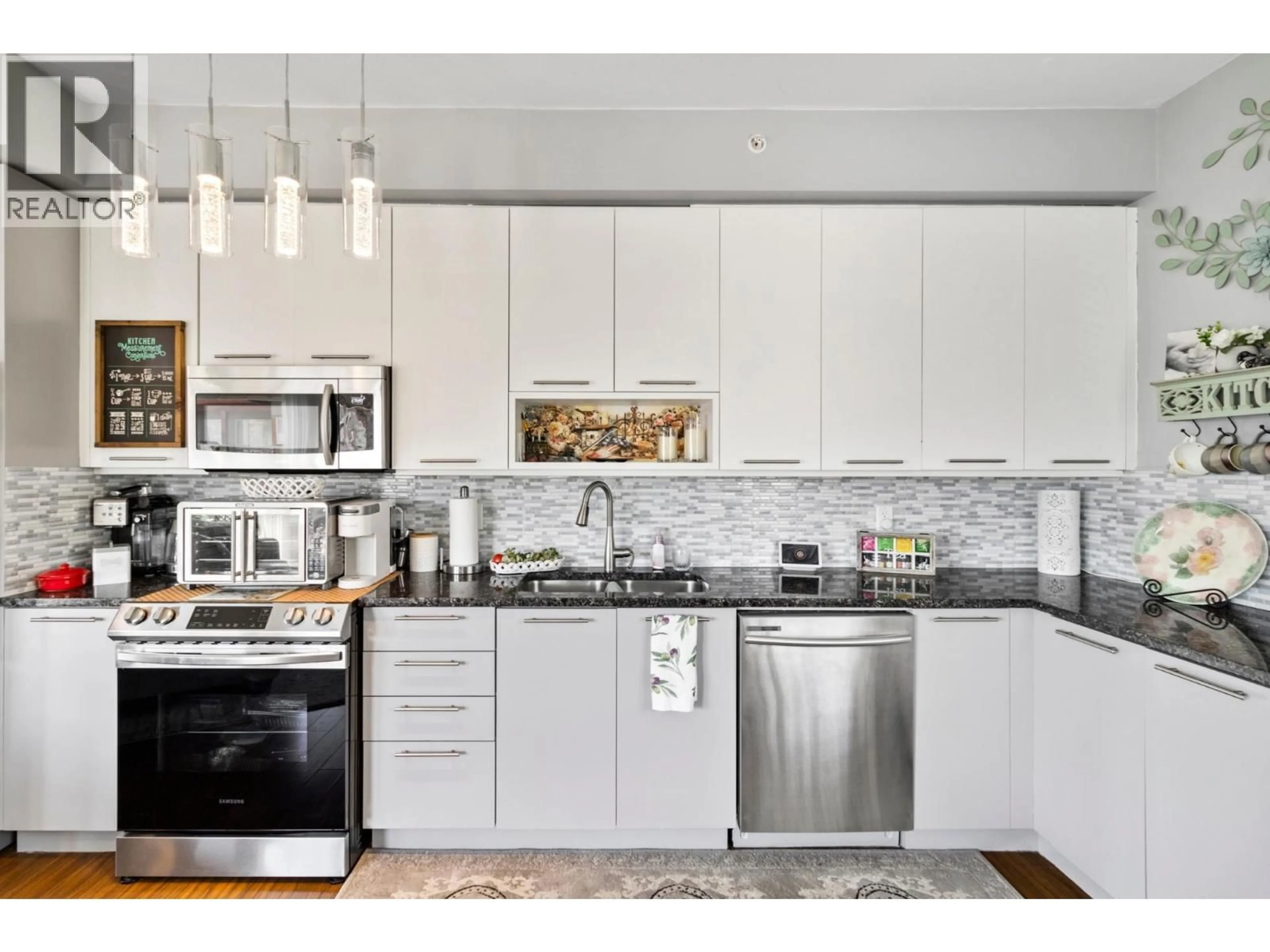 Open concept kitchen, ceramic/tile floor for 2413 - 1030 TALASA WAY, Kamloops British Columbia V2H0C3