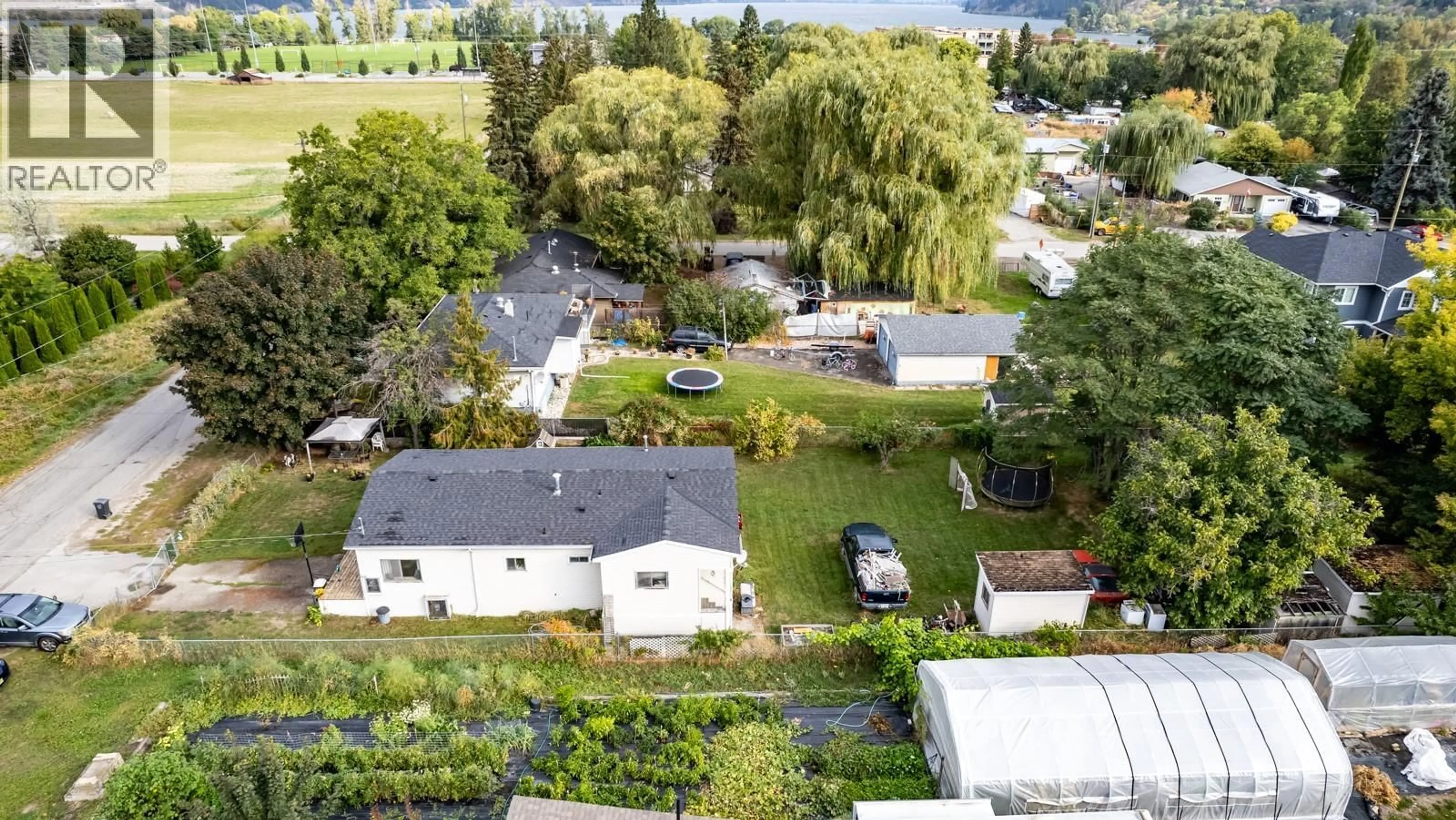 A pic from outside/outdoor area/front of a property/back of a property/a pic from drone, street for 11337 REISWIG ROAD, Lake Country British Columbia V4V1X5