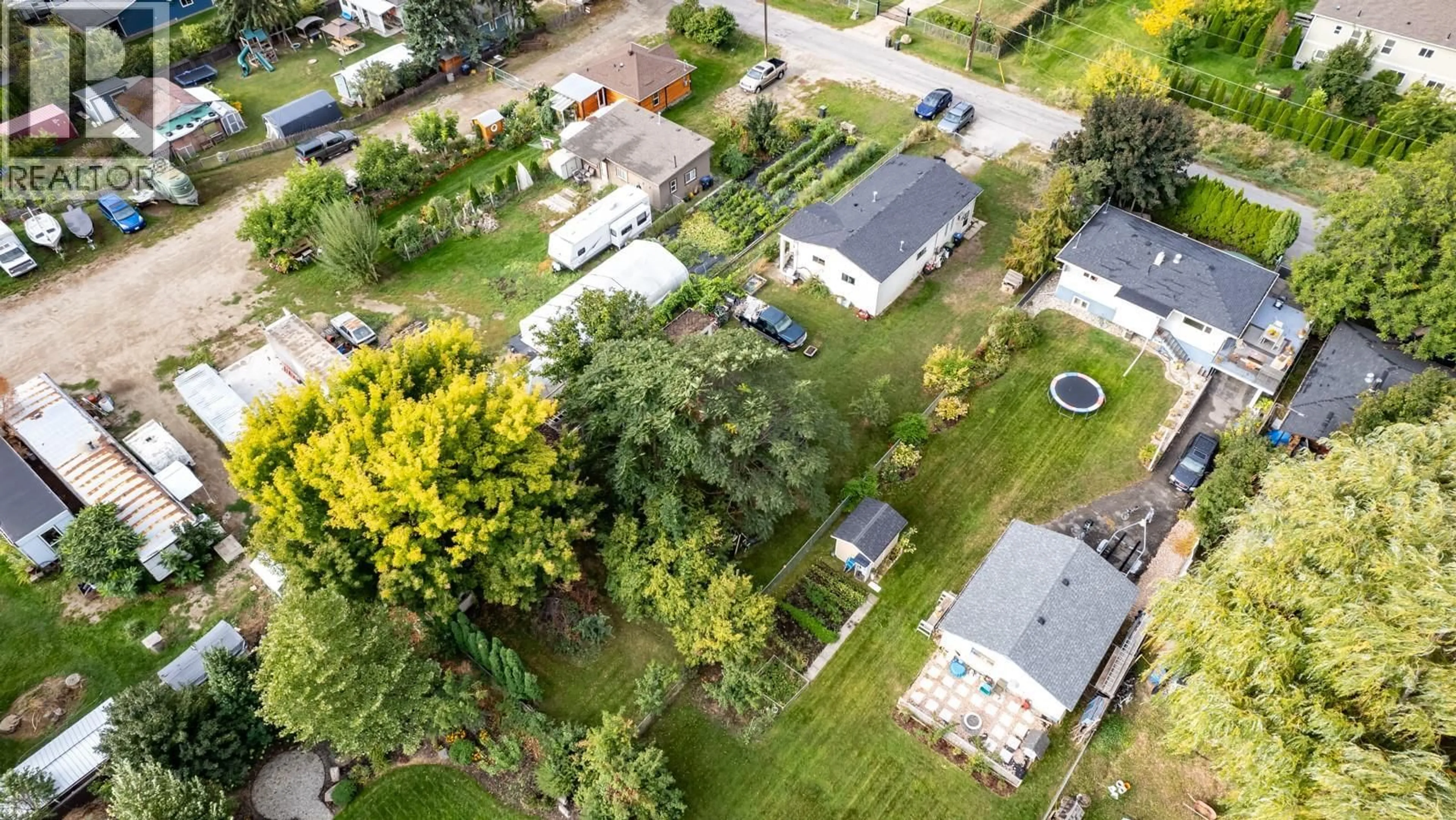 A pic from outside/outdoor area/front of a property/back of a property/a pic from drone, street for 11337 REISWIG ROAD, Lake Country British Columbia V4V1X5