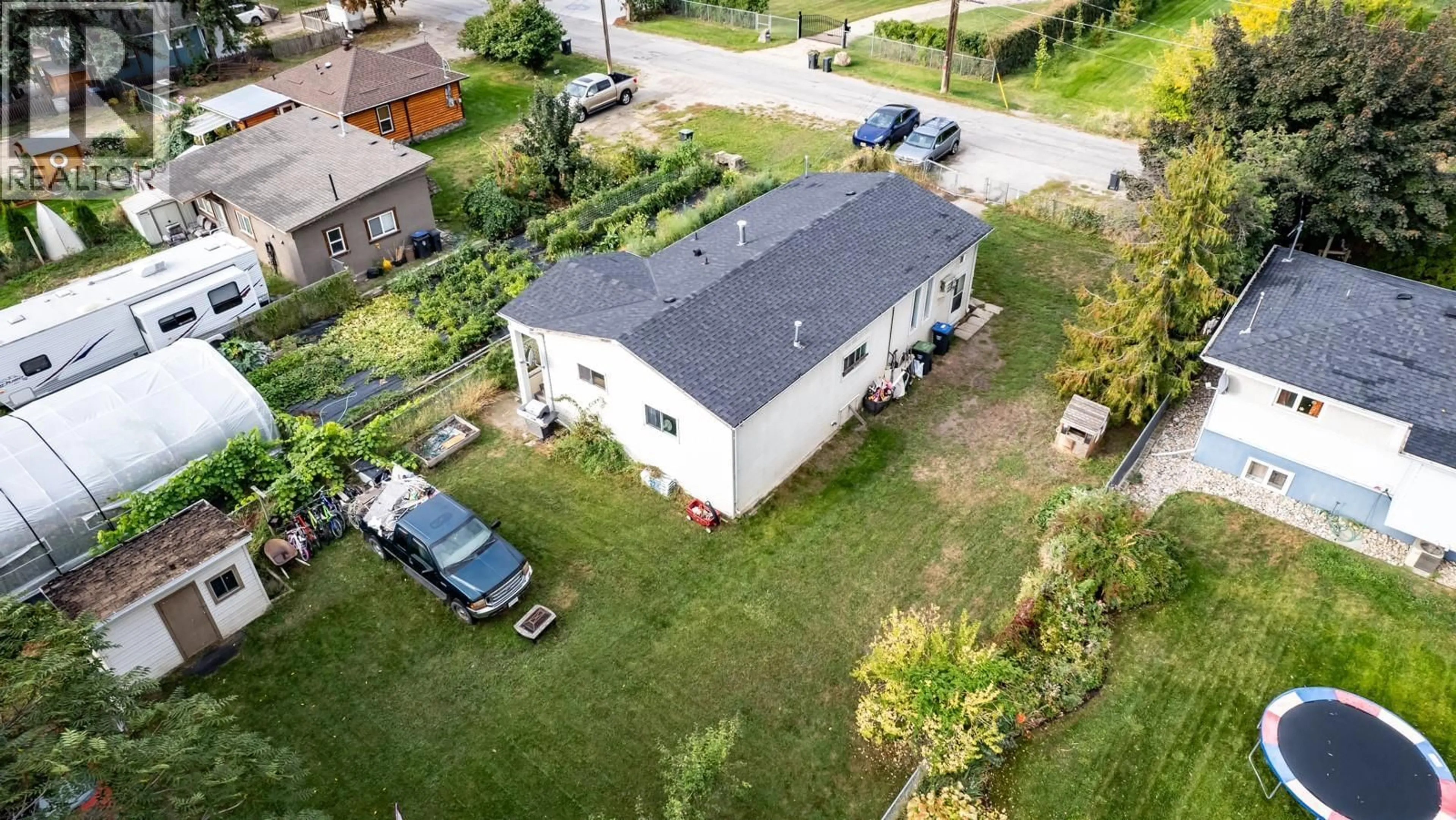 A pic from outside/outdoor area/front of a property/back of a property/a pic from drone, street for 11337 REISWIG ROAD, Lake Country British Columbia V4V1X5