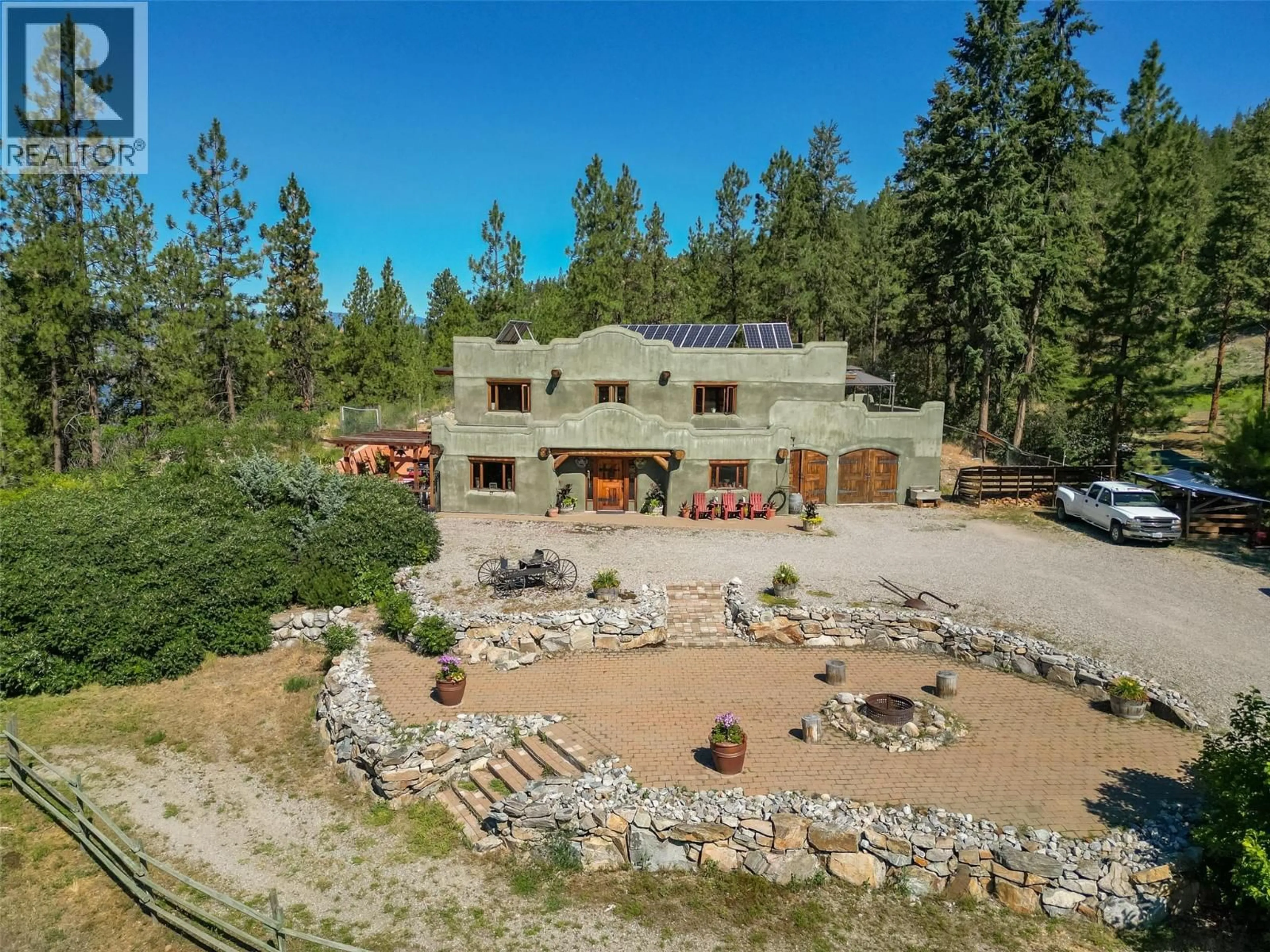 A pic from outside/outdoor area/front of a property/back of a property/a pic from drone, mountain view for 1525 SMETHURST ROAD, Naramata British Columbia V2A1N0