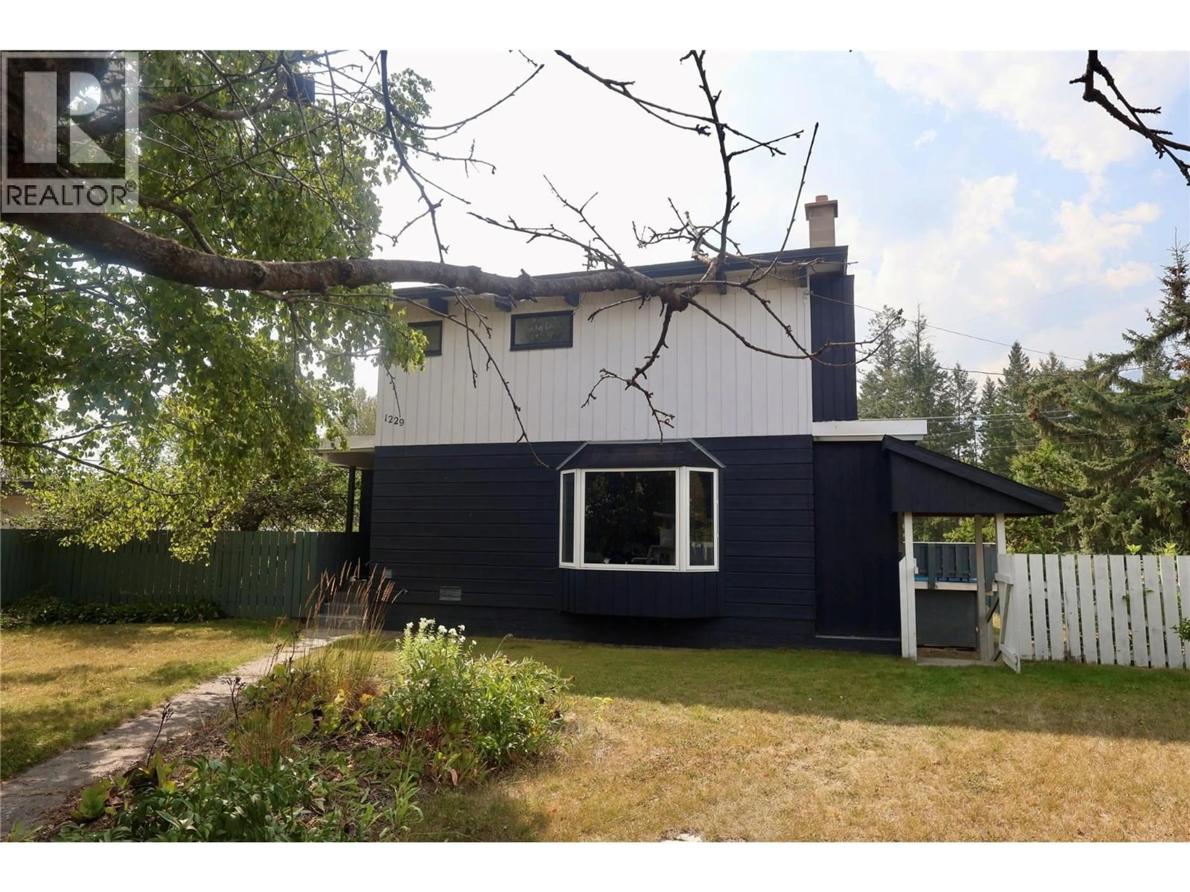 Home with vinyl exterior material, street for 1229 ALEXANDER DRIVE, Golden British Columbia V0A1H0