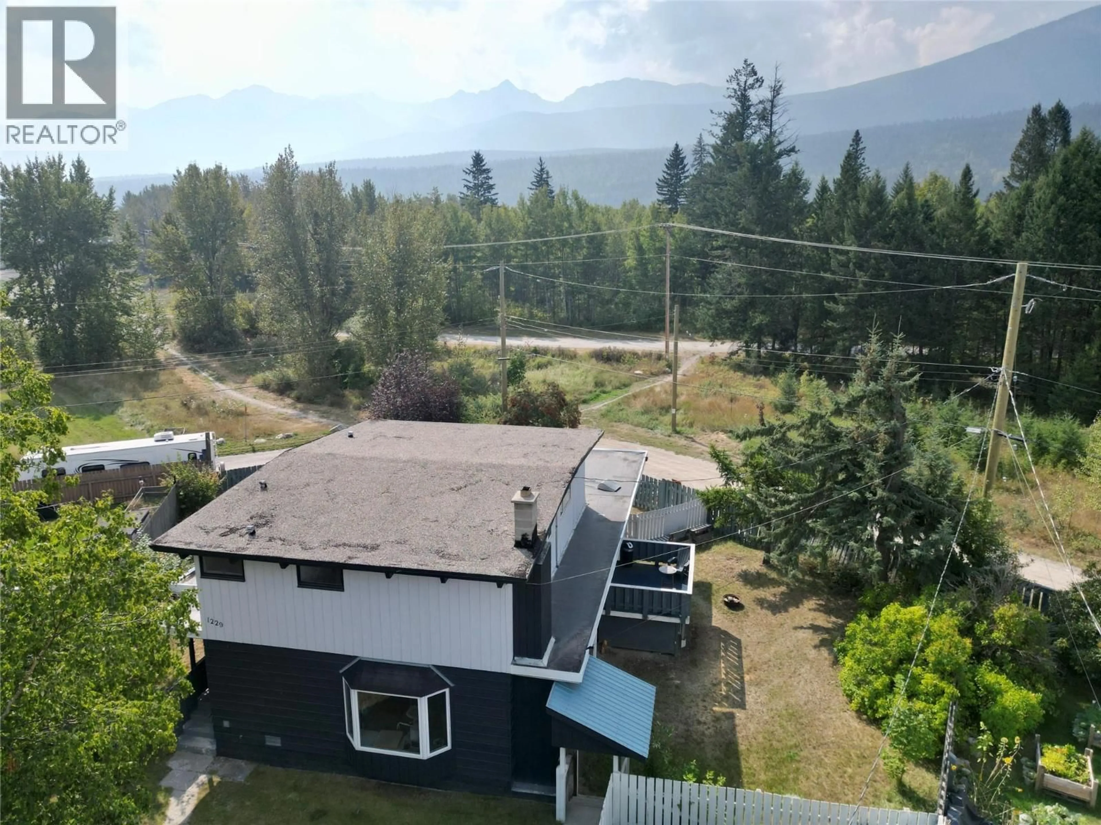 A pic from outside/outdoor area/front of a property/back of a property/a pic from drone, mountain view for 1229 ALEXANDER DRIVE, Golden British Columbia V0A1H0