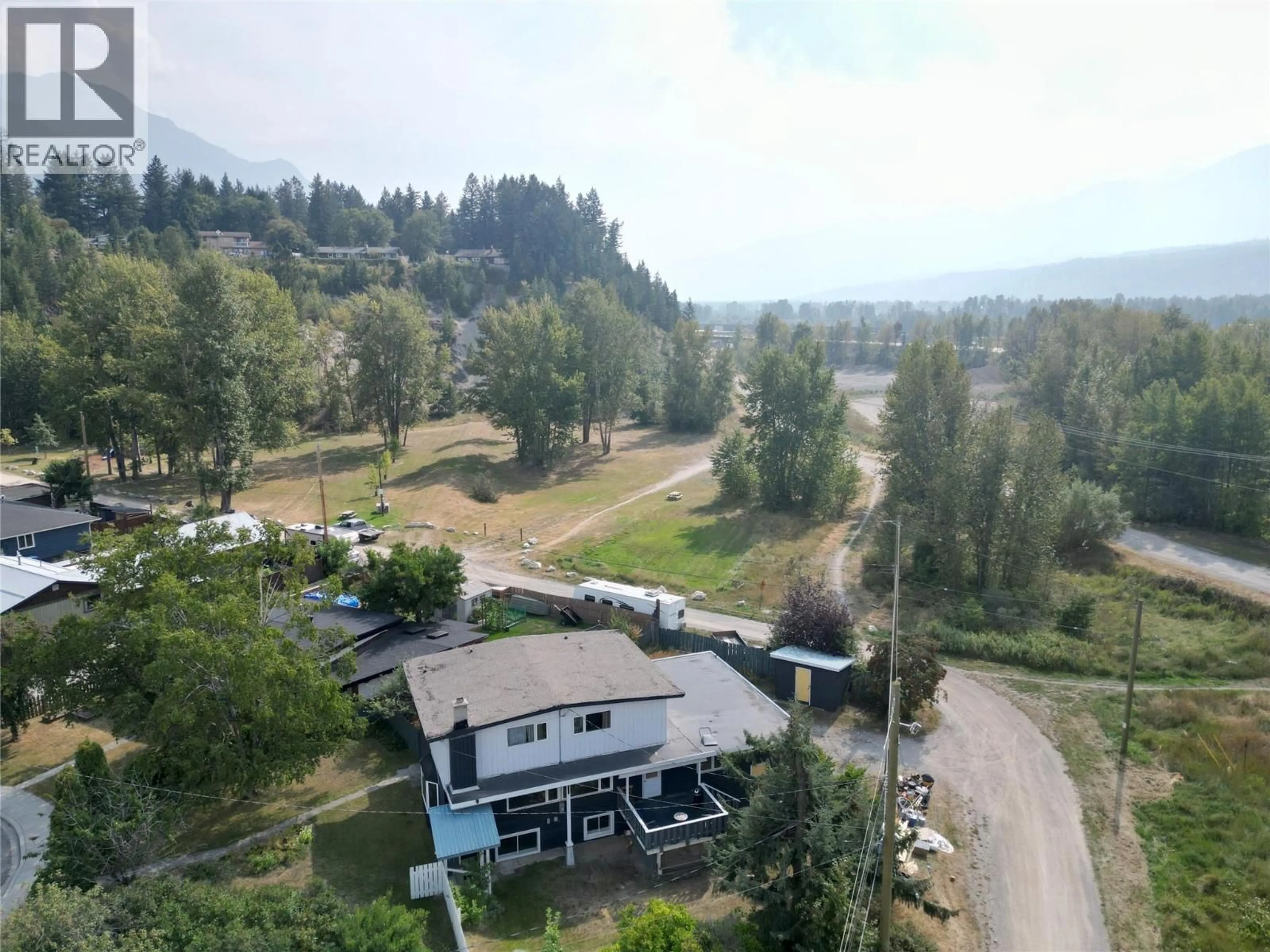 A pic from outside/outdoor area/front of a property/back of a property/a pic from drone, mountain view for 1229 ALEXANDER DRIVE, Golden British Columbia V0A1H0
