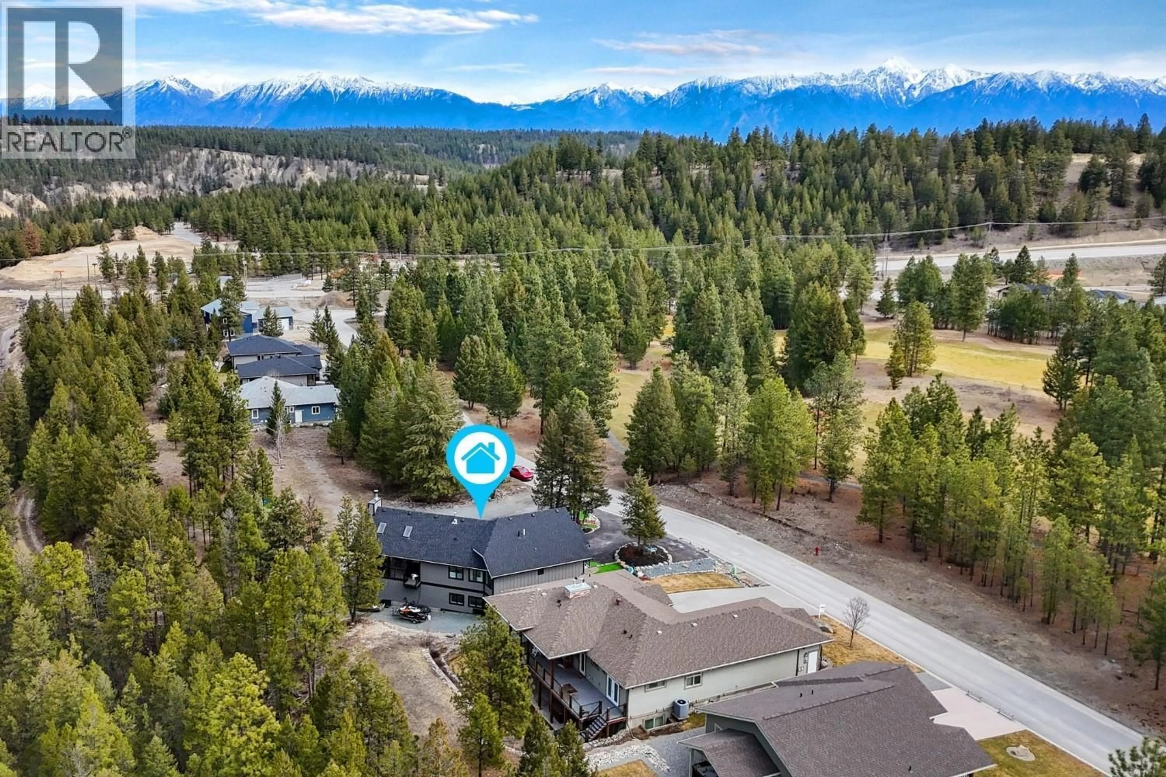 A pic from outside/outdoor area/front of a property/back of a property/a pic from drone, mountain view for 136 PURCELL PLACE, Cranbrook British Columbia V1C0C6