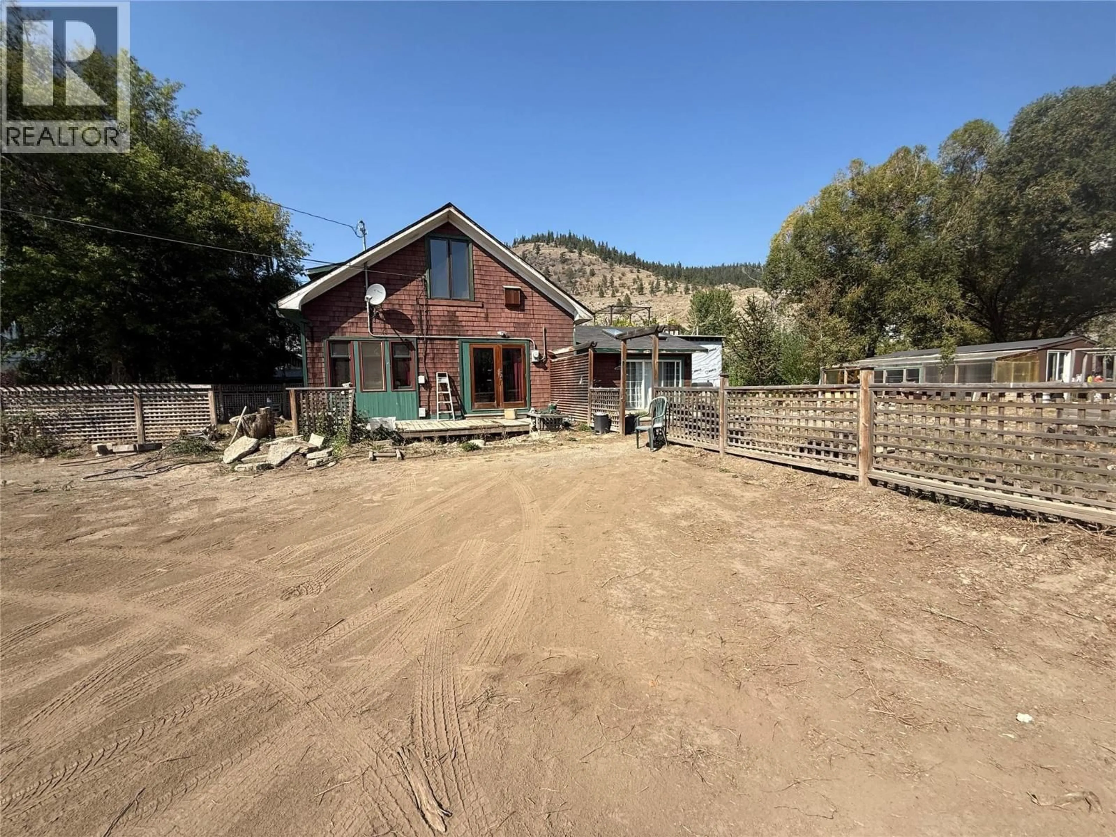 A pic from outside/outdoor area/front of a property/back of a property/a pic from drone, building for 1325 QUILCHENA AVENUE, Merritt British Columbia V1K1B8