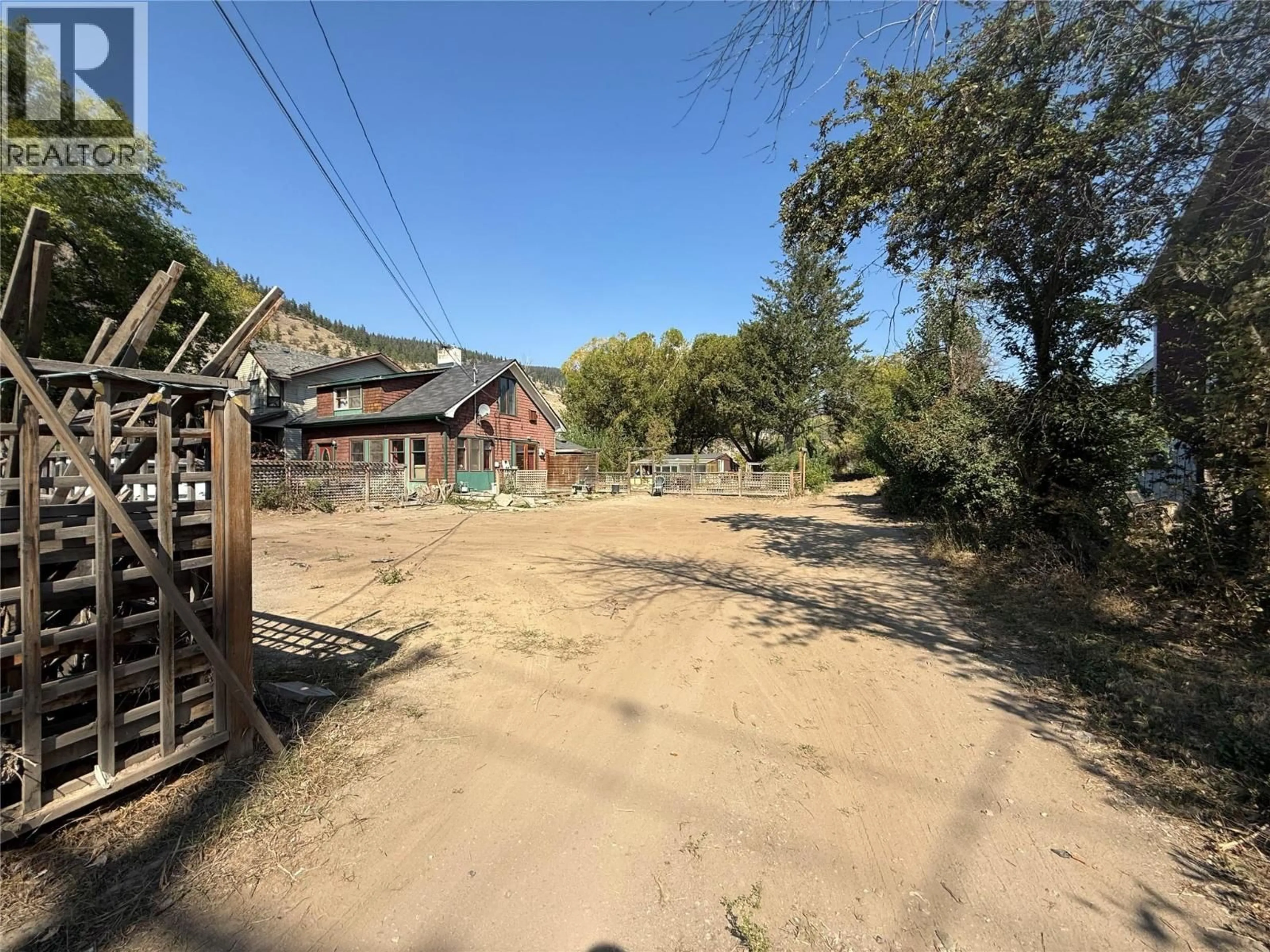 A pic from outside/outdoor area/front of a property/back of a property/a pic from drone, street for 1325 QUILCHENA AVENUE, Merritt British Columbia V1K1B8