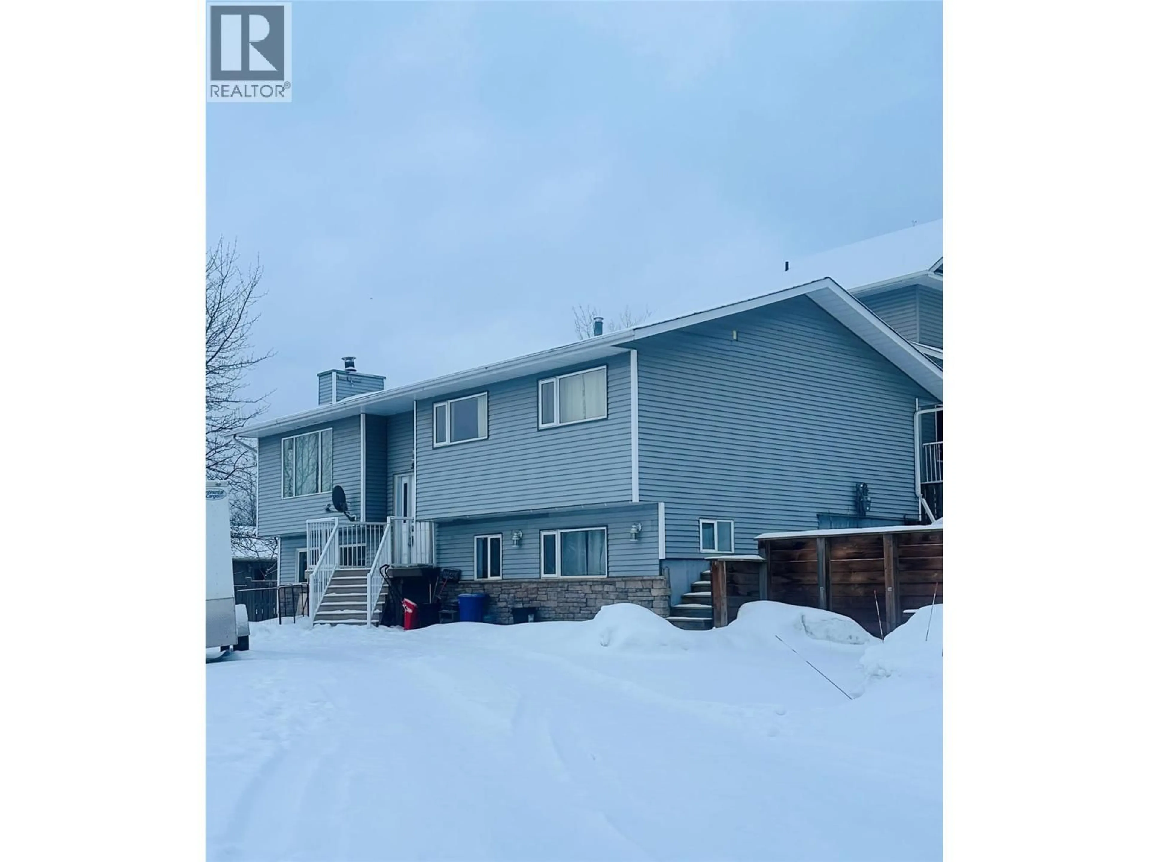 A pic from outside/outdoor area/front of a property/back of a property/a pic from drone, street for 5301 44A AVENUE NORTHWEST, Chetwynd British Columbia V0C1J0