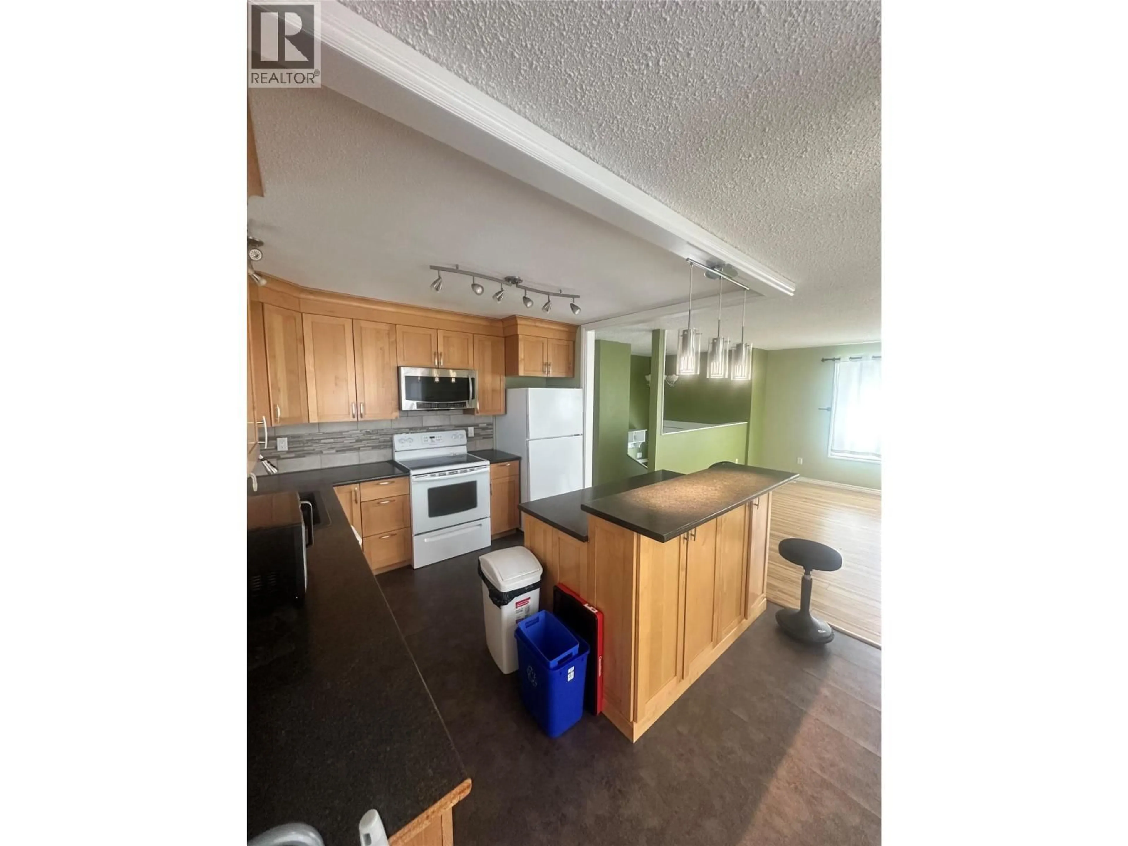 Open concept kitchen, unknown for 5301 44A AVENUE NORTHWEST, Chetwynd British Columbia V0C1J0
