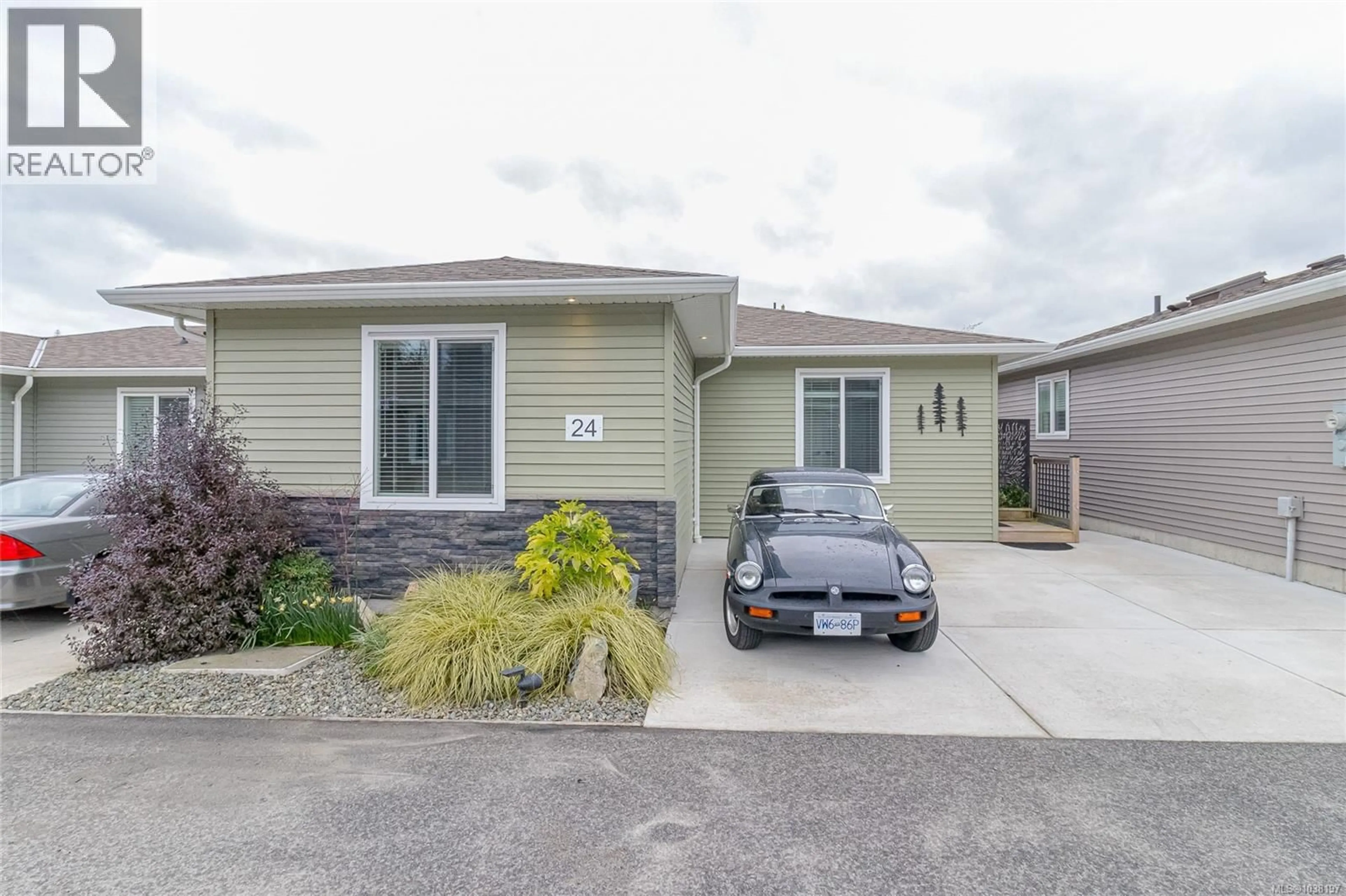 Home with vinyl exterior material, street for 24 - 7650 QWUC CHUS LANE, Central Saanich British Columbia V8M0B4