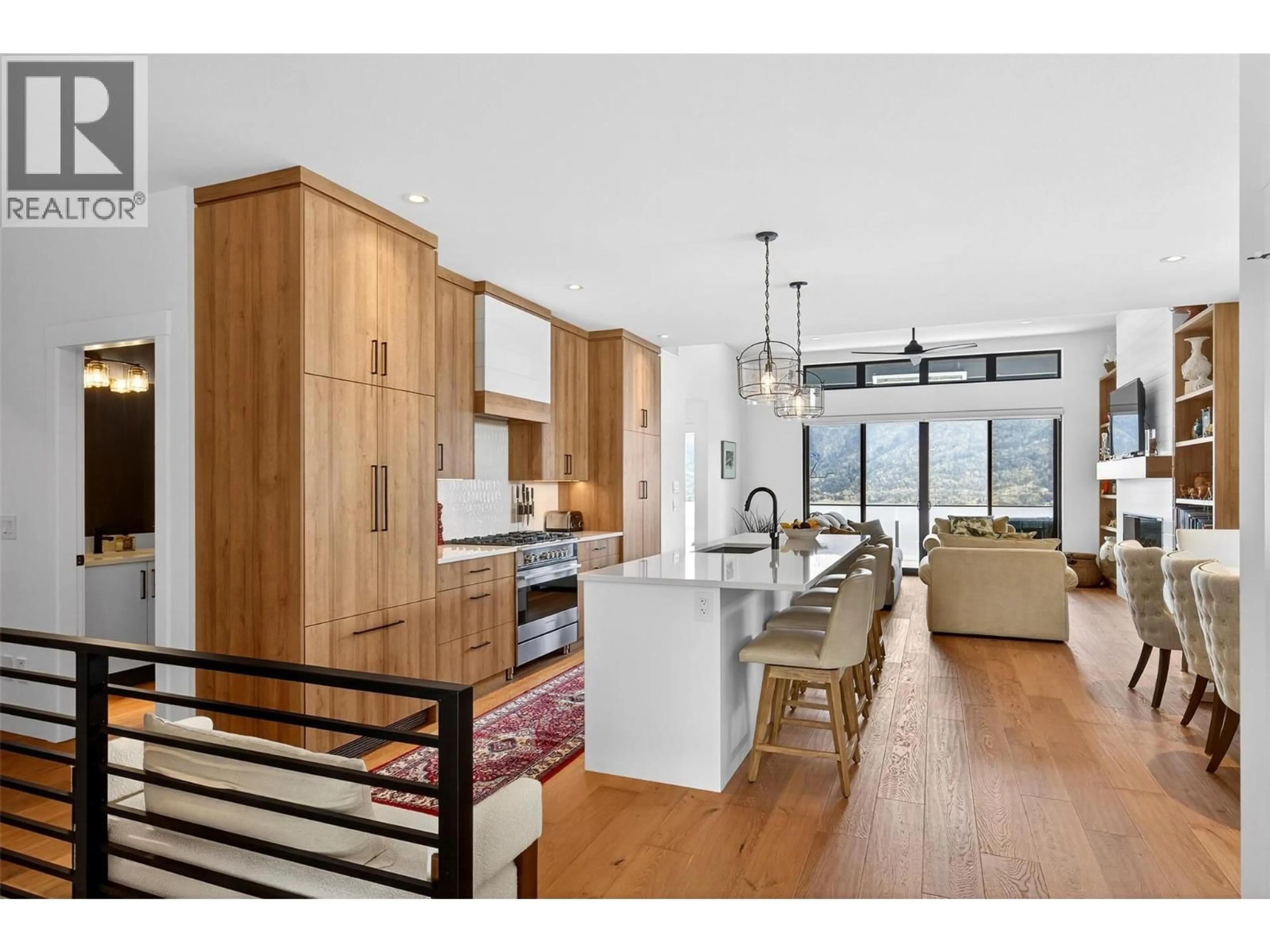 Open concept kitchen, wood/laminate floor for 12 - 9201 OKANAGAN CENTRE ROAD WEST, Lake Country British Columbia V4V0B8