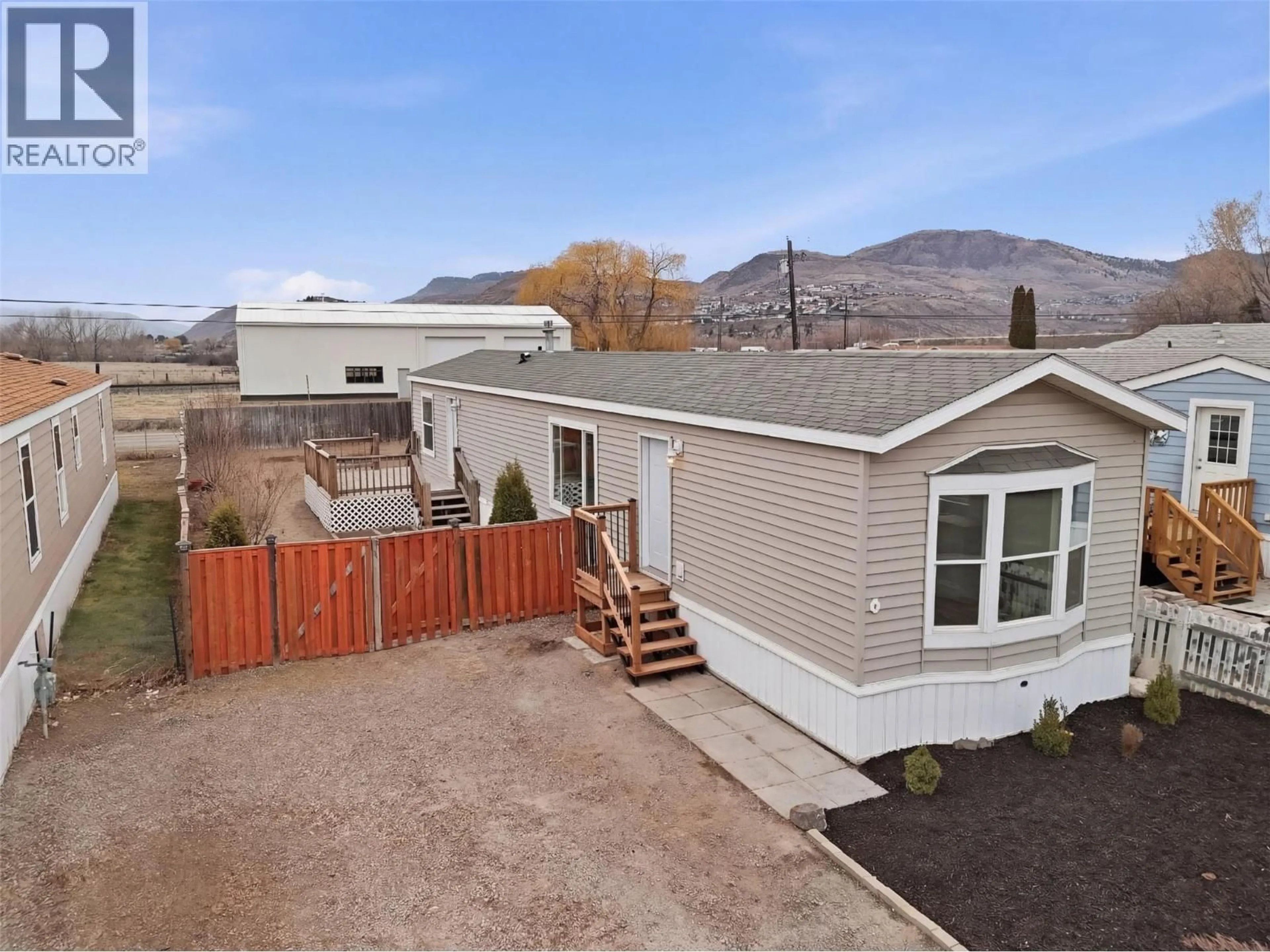 A pic from outside/outdoor area/front of a property/back of a property/a pic from drone, mountain view for 6 - 1263 KOOTENAY WAY, Kamloops British Columbia V2H0C5