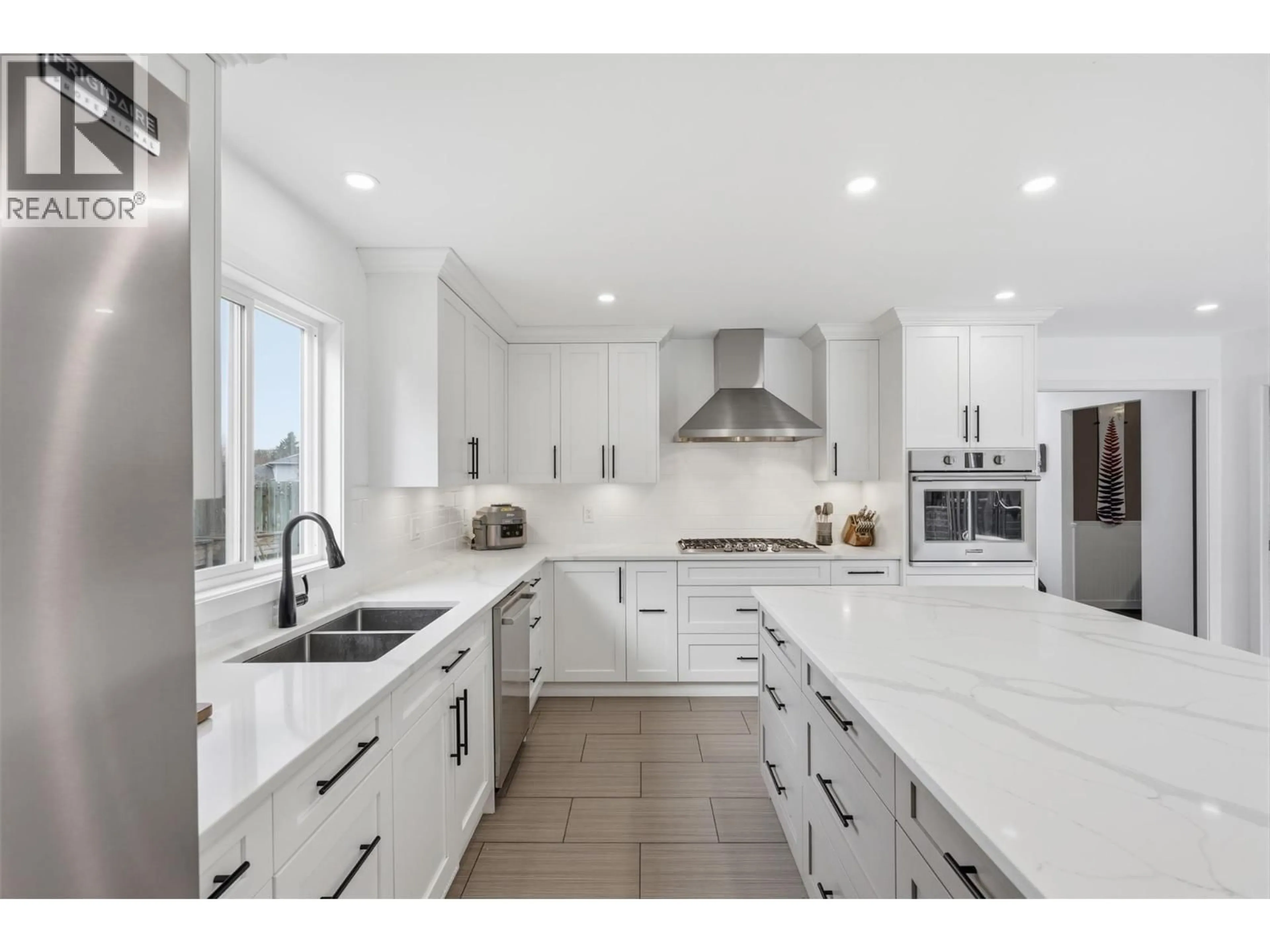 Open concept kitchen, ceramic/tile floor for 2298 BALFOUR COURT, Kamloops British Columbia V1S1H5