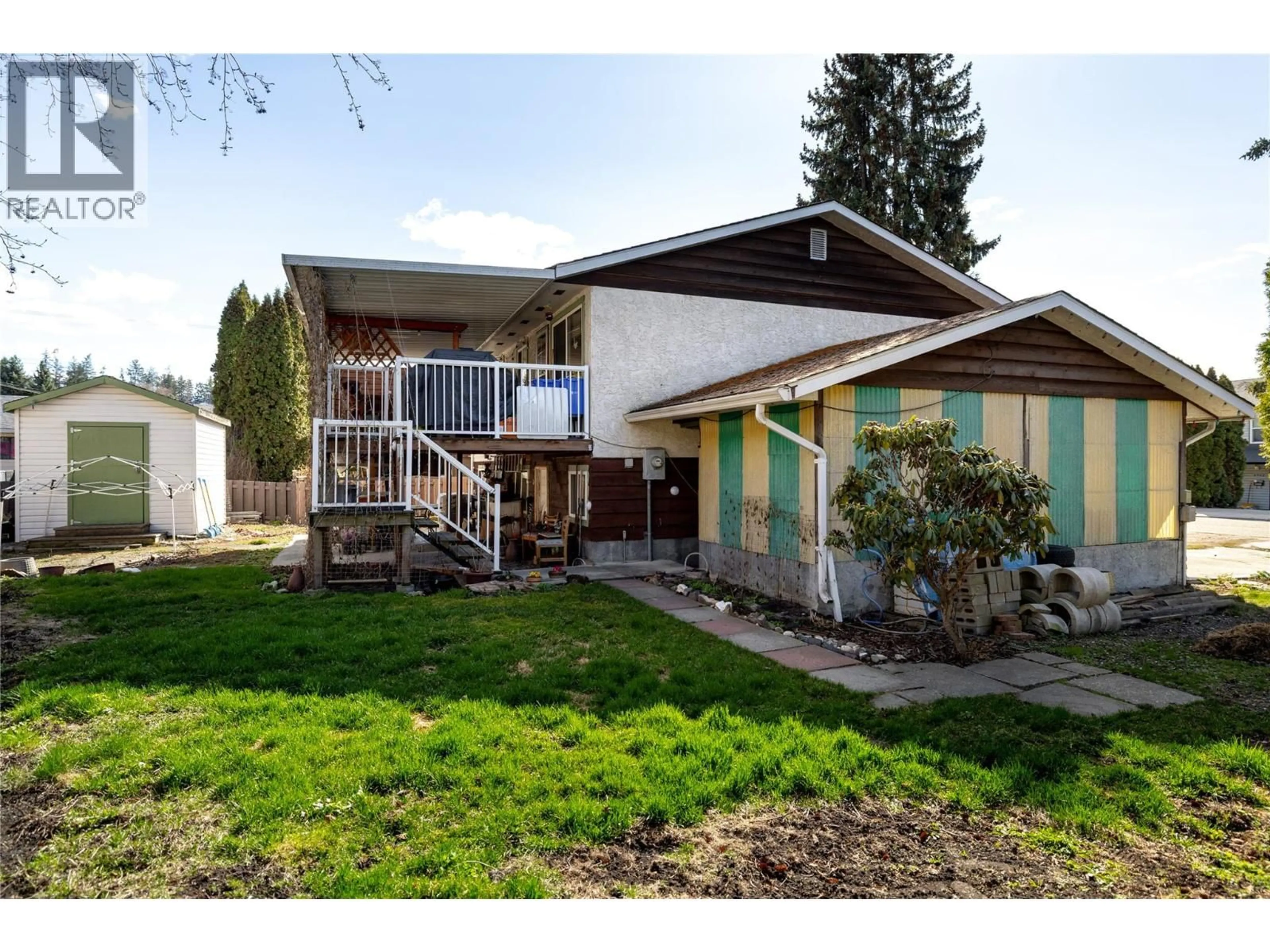 Home with vinyl exterior material, street for 4303 18 STREET, Vernon British Columbia V1T7E1