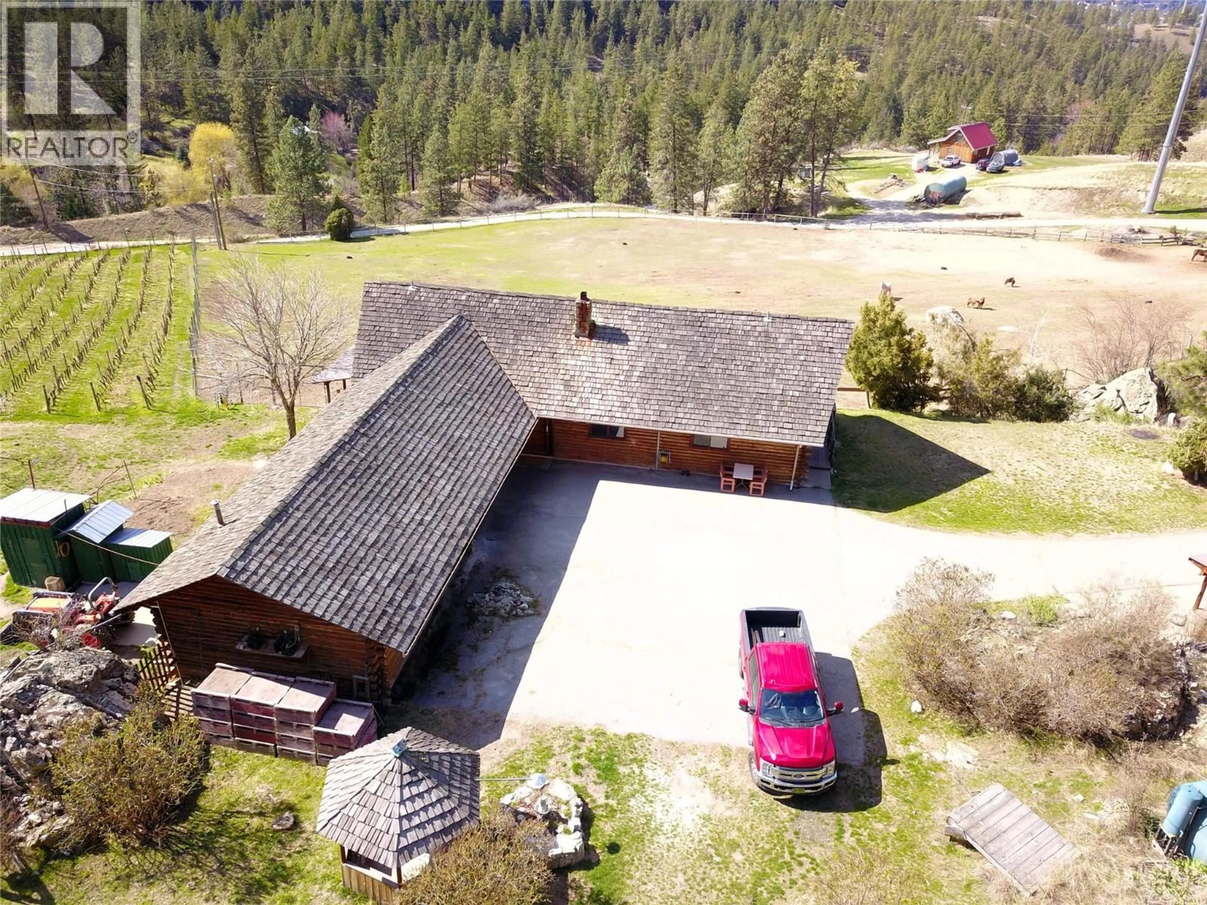 A pic from outside/outdoor area/front of a property/back of a property/a pic from drone, unknown for 3655 MCLEAN CREEK ROAD, Okanagan Falls British Columbia V0H1R5