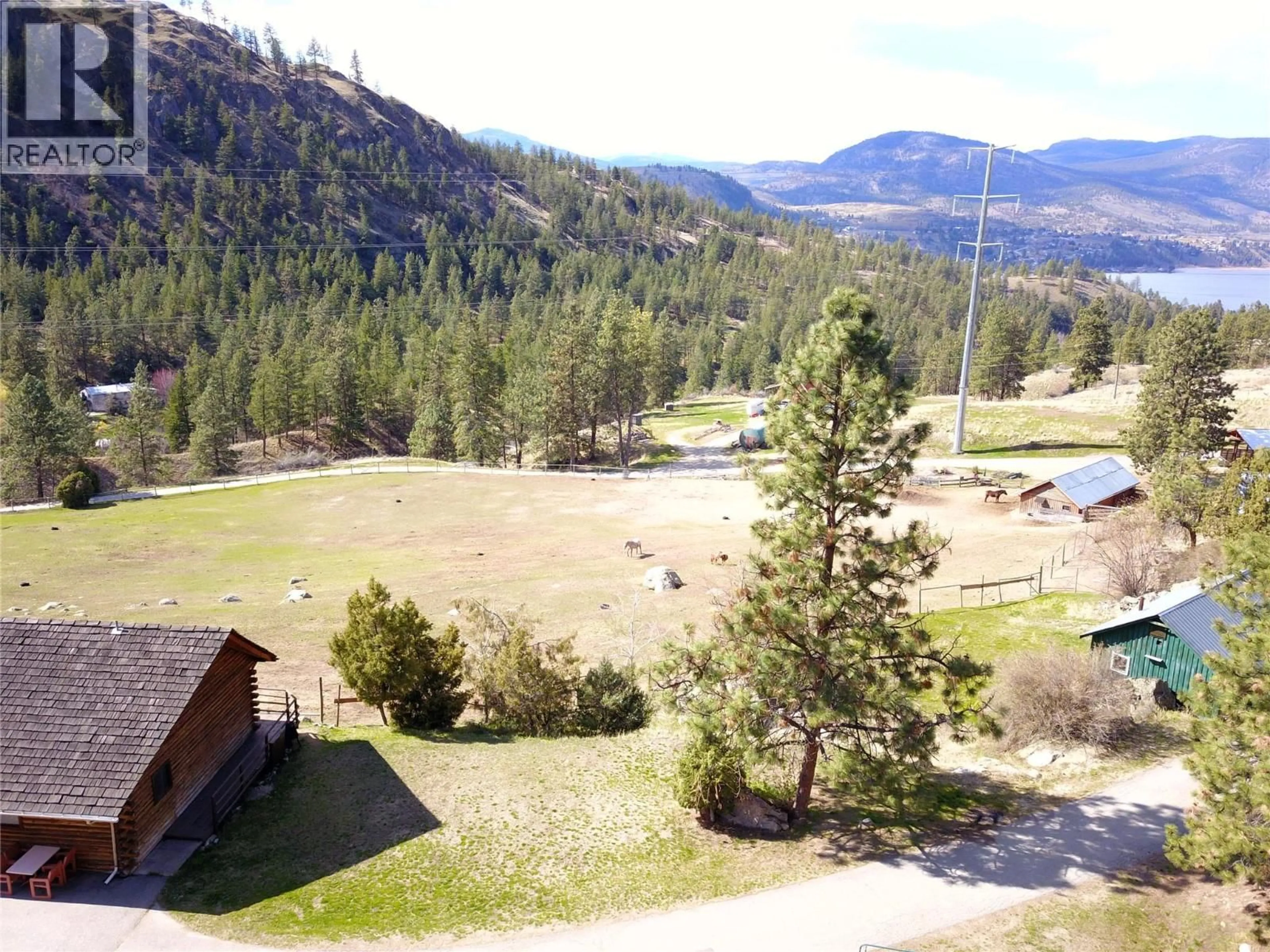 A pic from outside/outdoor area/front of a property/back of a property/a pic from drone, mountain view for 3655 MCLEAN CREEK ROAD, Okanagan Falls British Columbia V0H1R5