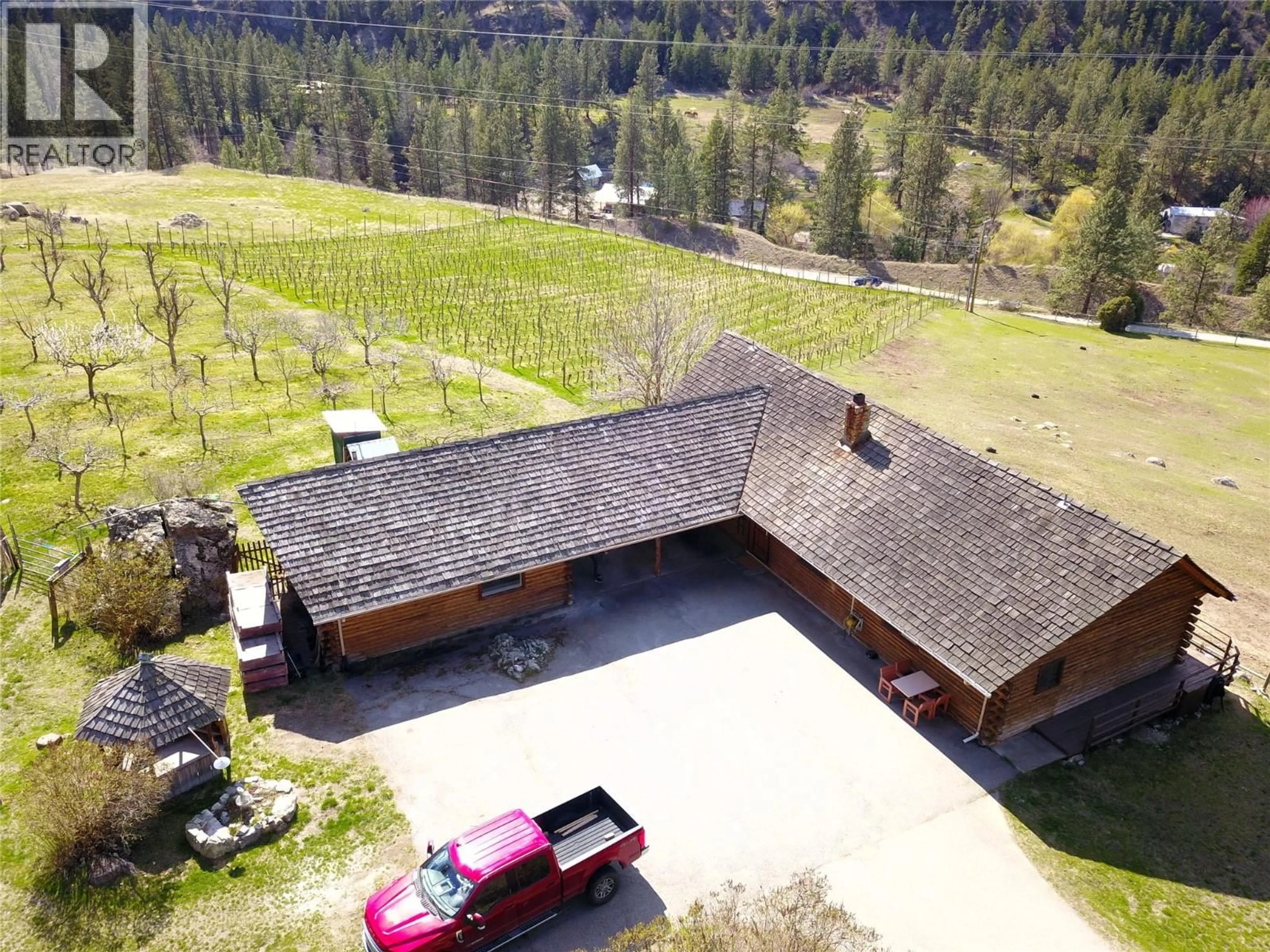 A pic from outside/outdoor area/front of a property/back of a property/a pic from drone, mountain view for 3655 MCLEAN CREEK ROAD, Okanagan Falls British Columbia V0H1R5