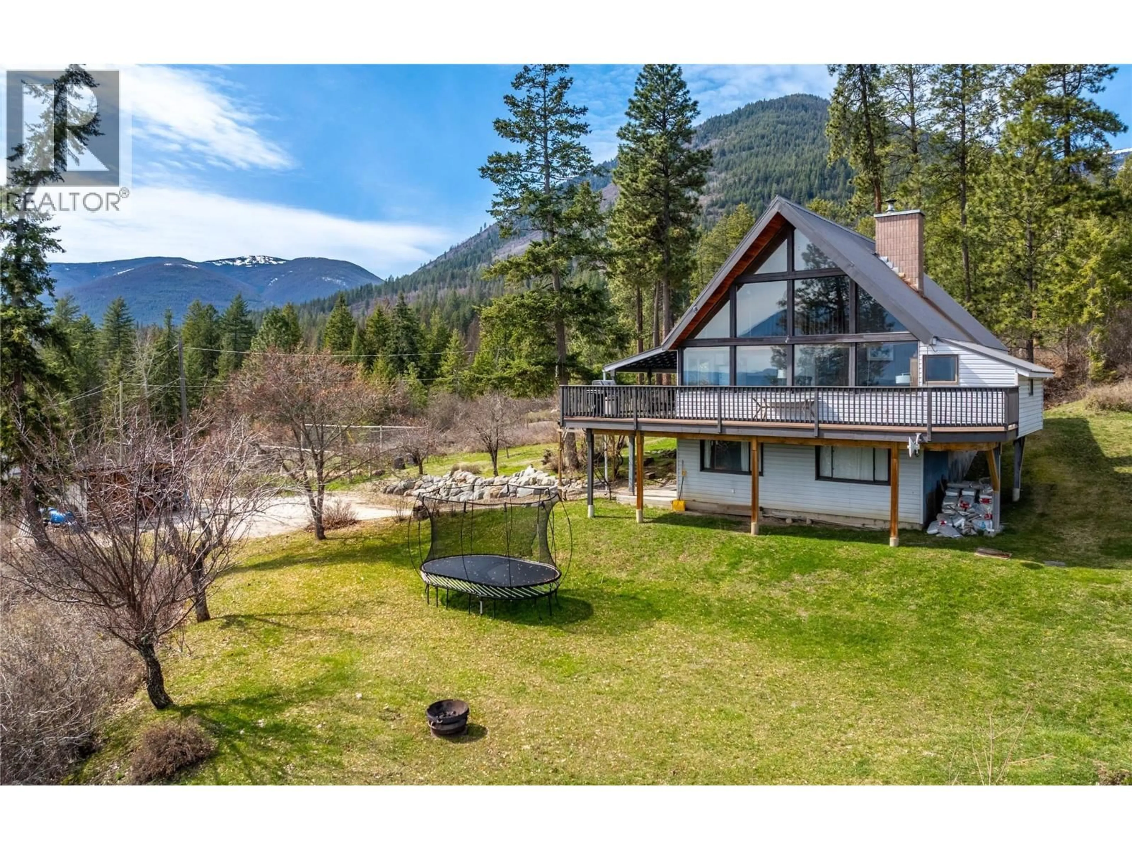 A pic from outside/outdoor area/front of a property/back of a property/a pic from drone, mountain view for 2250 CEDAR HILL ROAD, Creston British Columbia V0B1G7
