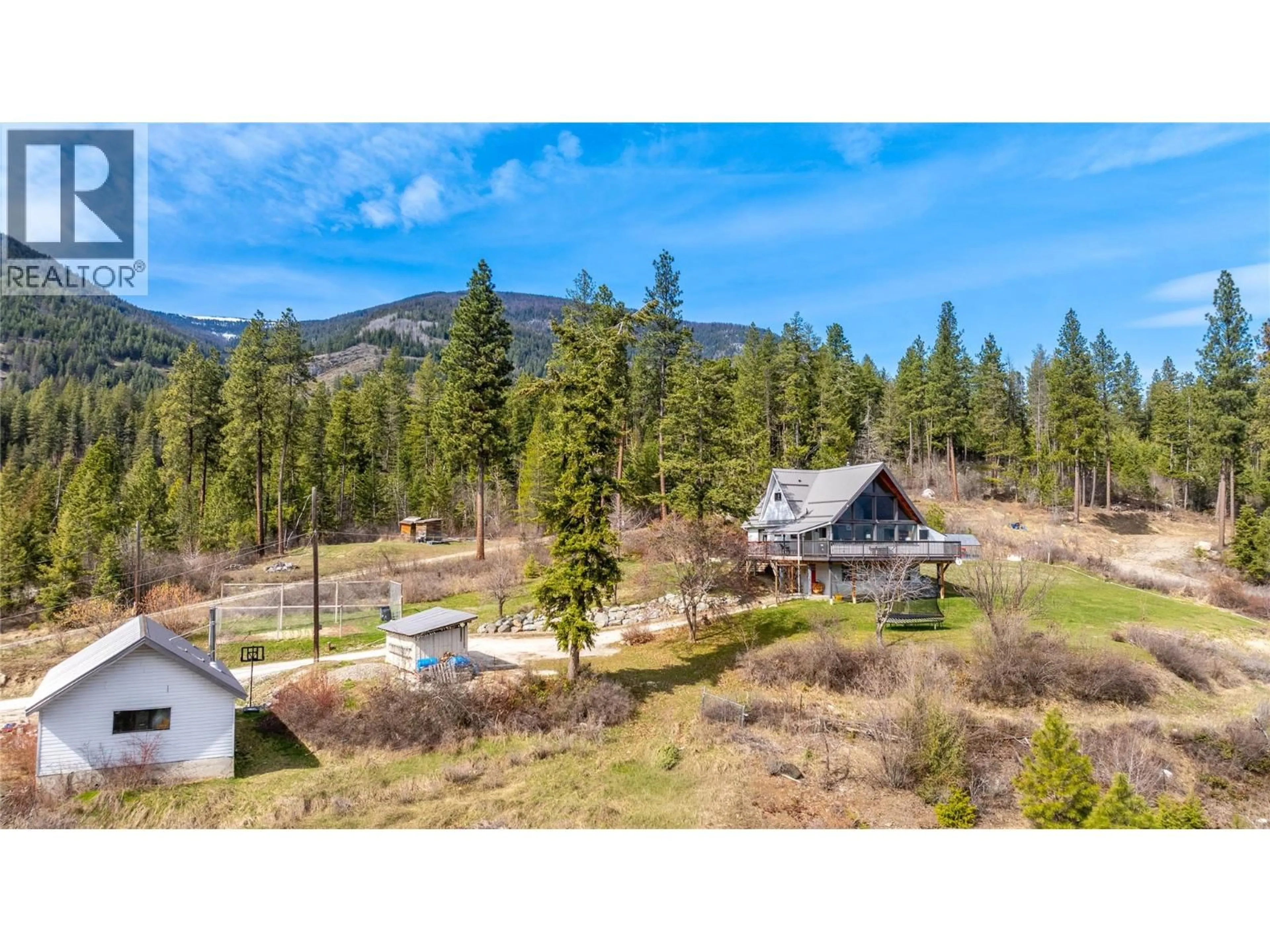 A pic from outside/outdoor area/front of a property/back of a property/a pic from drone, mountain view for 2250 CEDAR HILL ROAD, Creston British Columbia V0B1G7