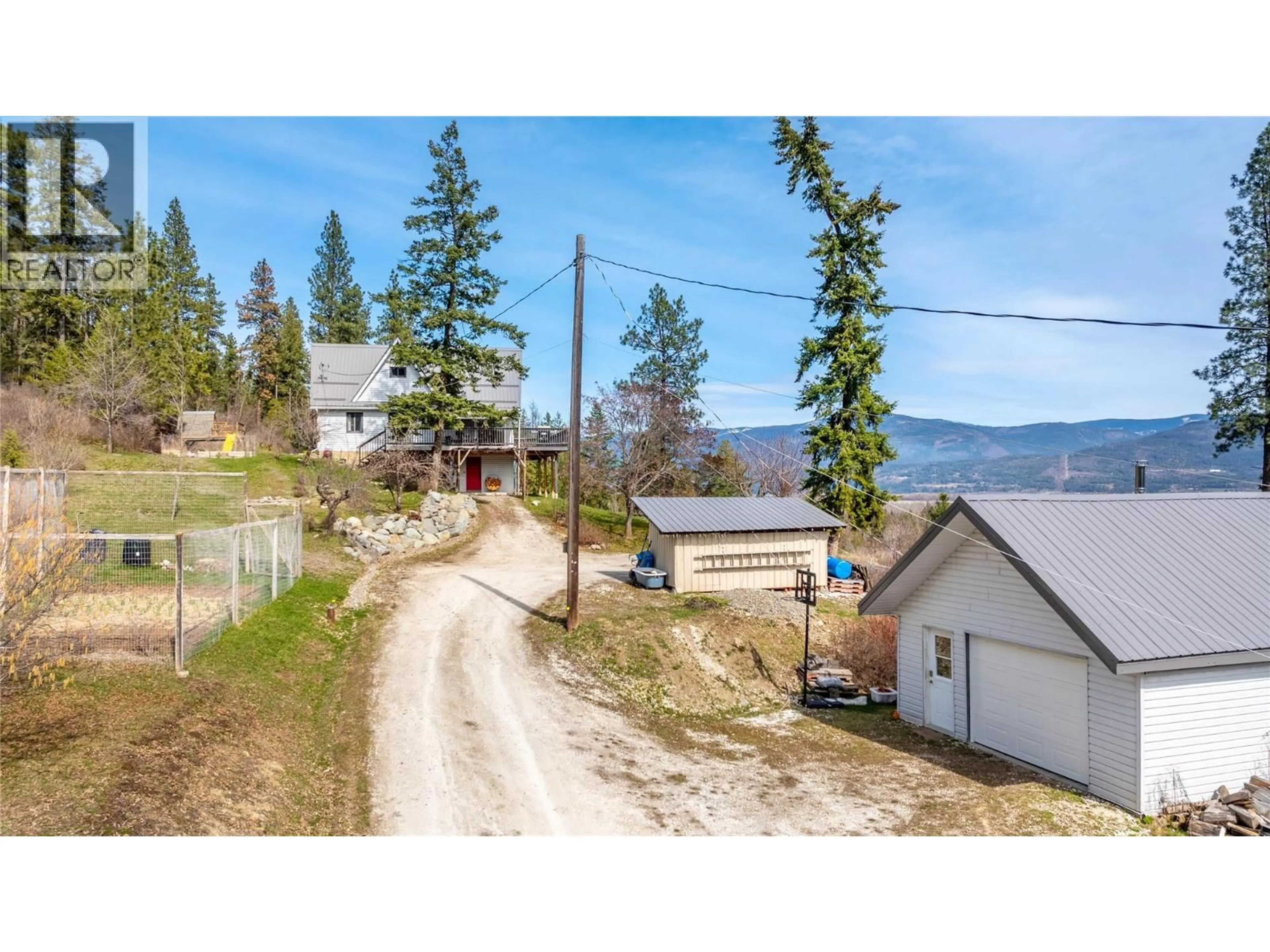 A pic from outside/outdoor area/front of a property/back of a property/a pic from drone, mountain view for 2250 CEDAR HILL ROAD, Creston British Columbia V0B1G7