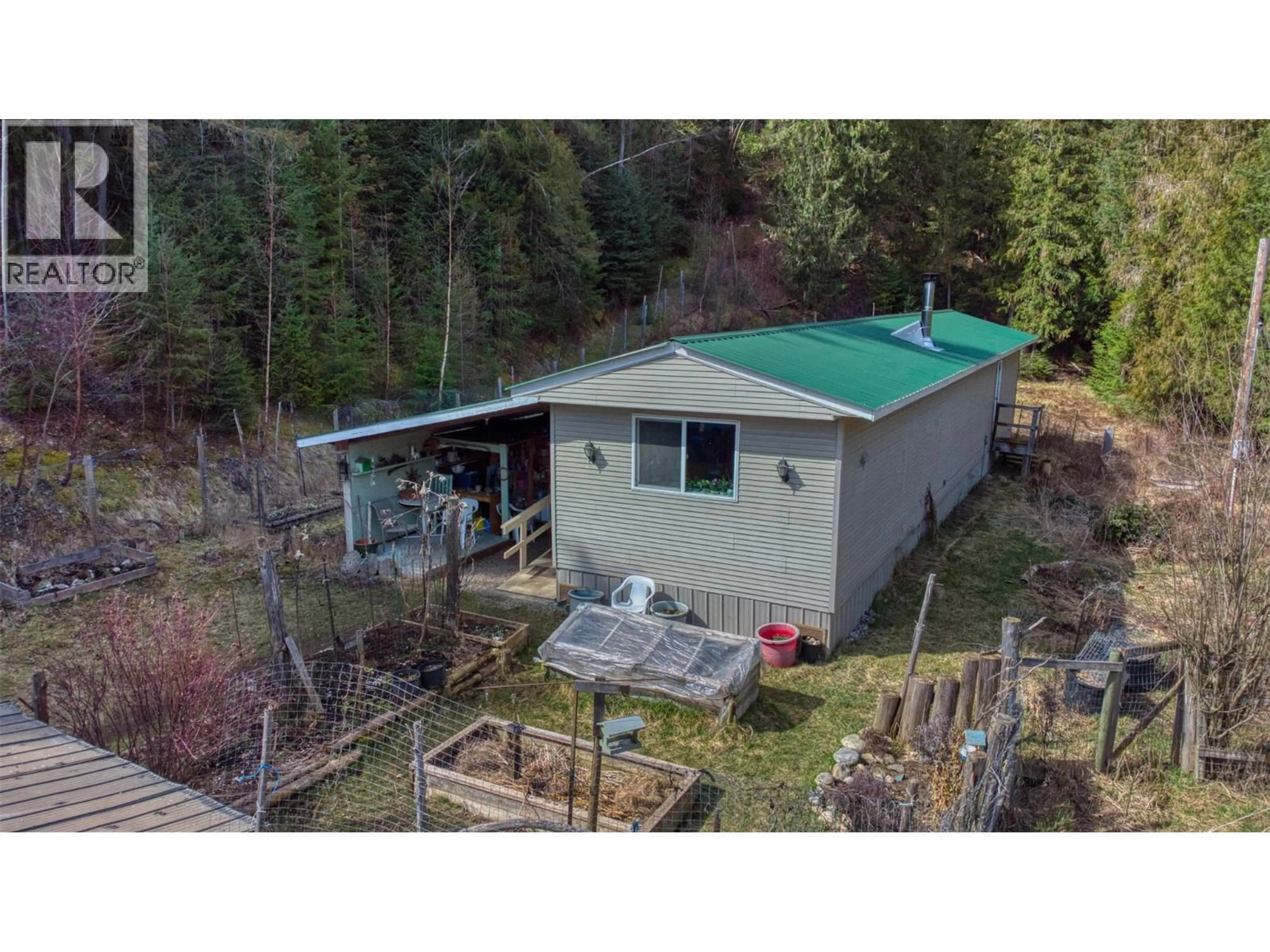 A pic from outside/outdoor area/front of a property/back of a property/a pic from drone, unknown for 150 NORTH FORK ROAD, Cherryville British Columbia V0E2G0