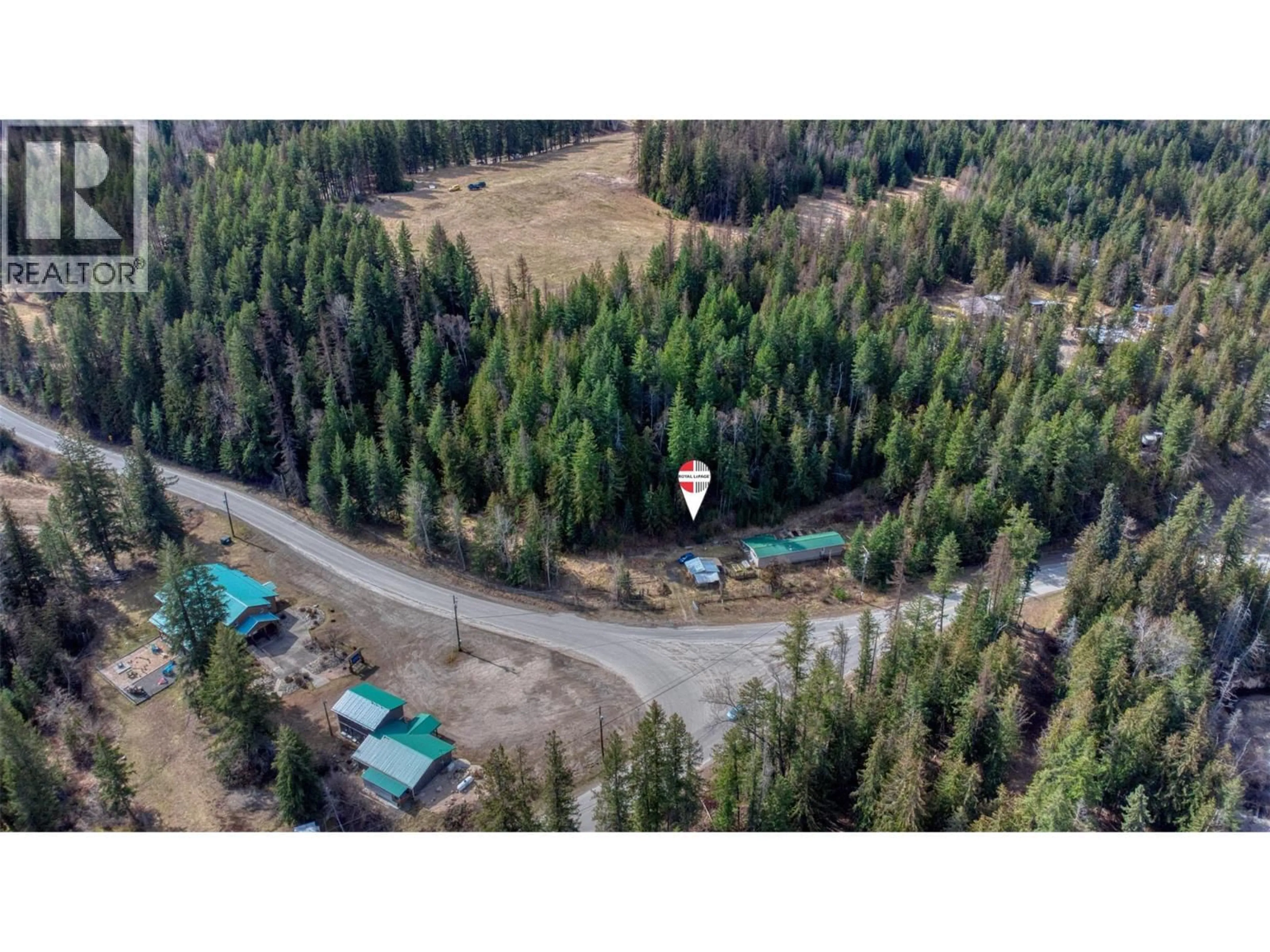 A pic from outside/outdoor area/front of a property/back of a property/a pic from drone, forest/trees view for 150 NORTH FORK ROAD, Cherryville British Columbia V0E2G0