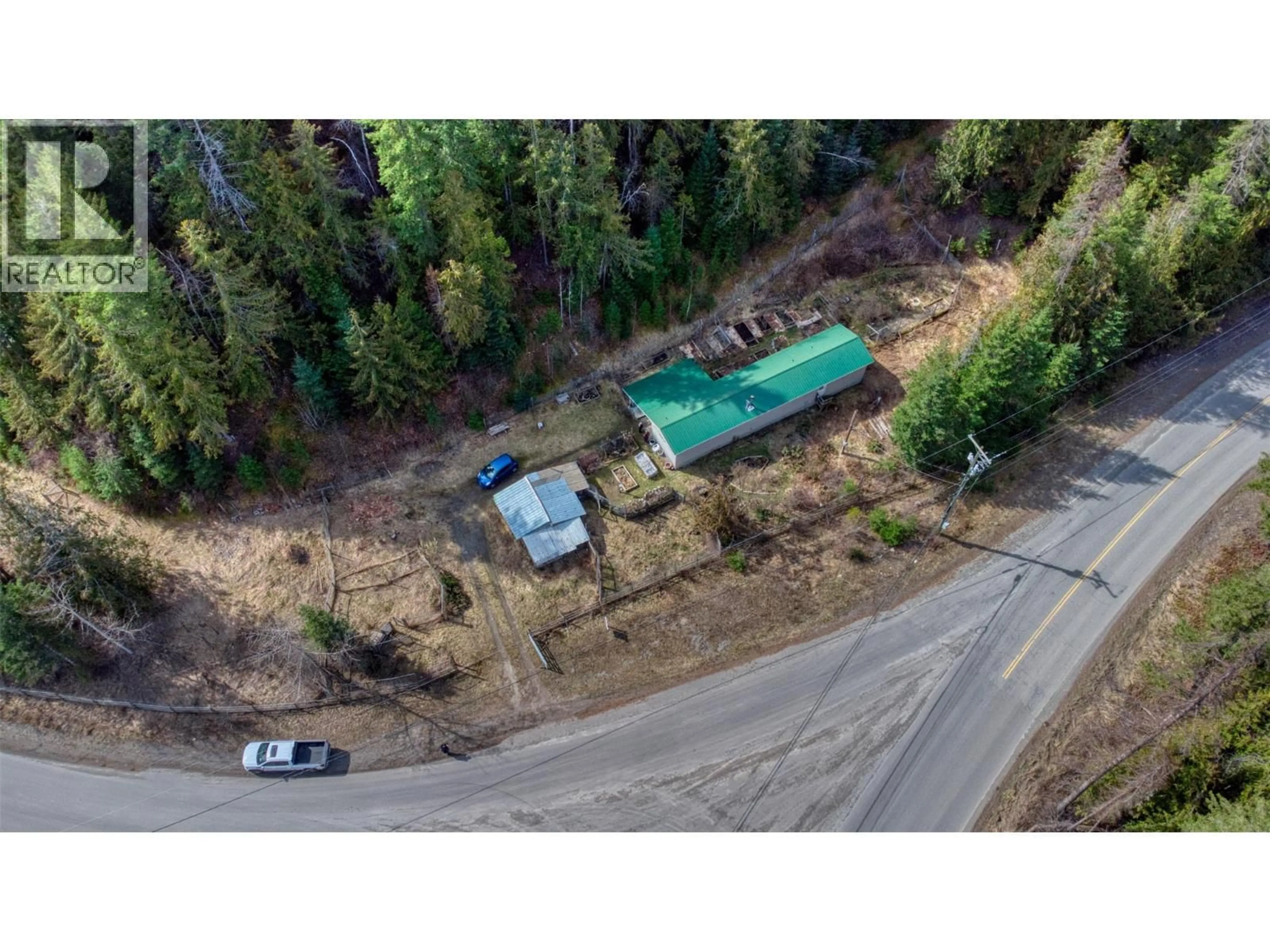 A pic from outside/outdoor area/front of a property/back of a property/a pic from drone, forest/trees view for 150 NORTH FORK ROAD, Cherryville British Columbia V0E2G0